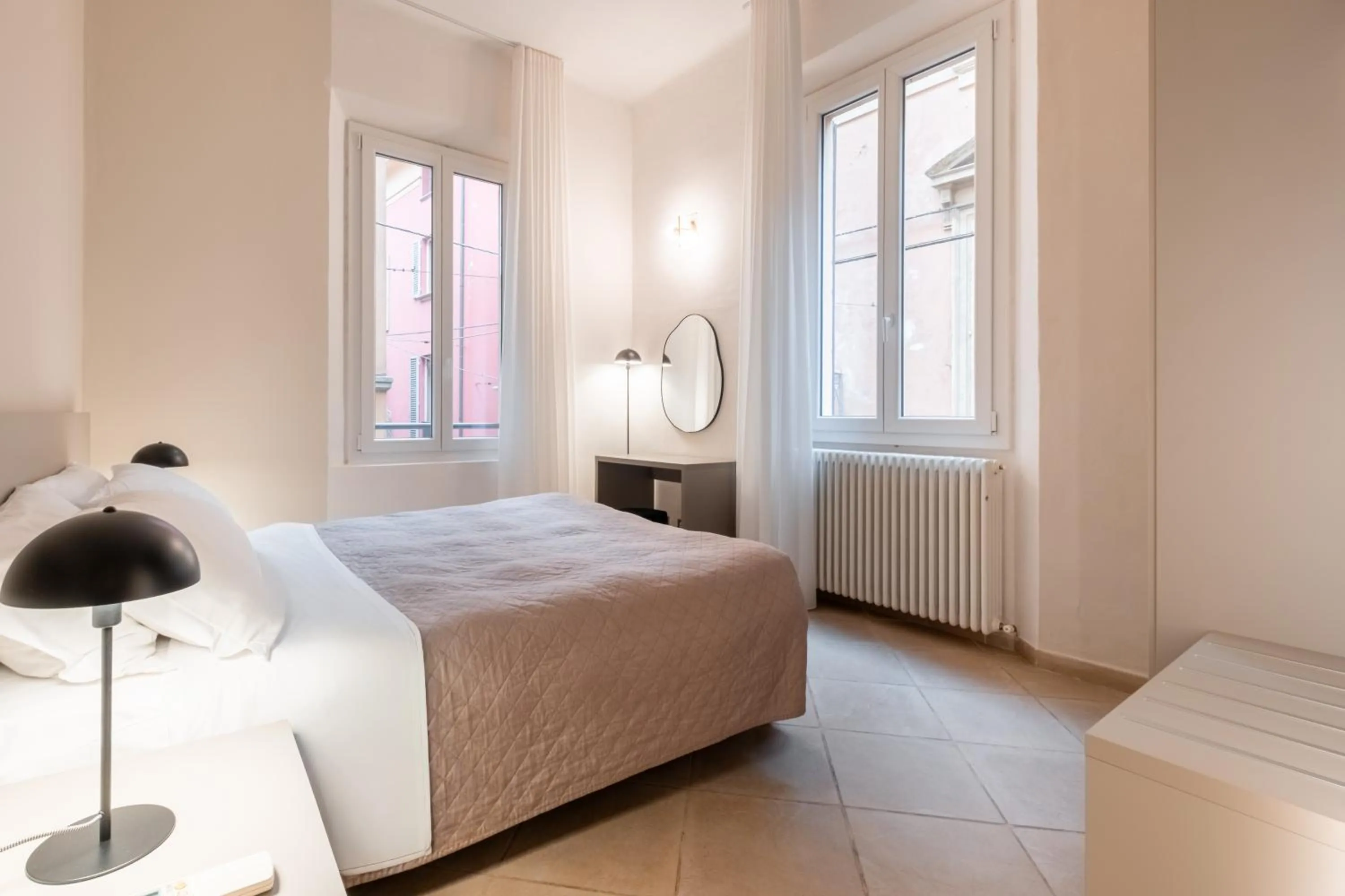 Bed in Residenza Ariosto by Studio Vita