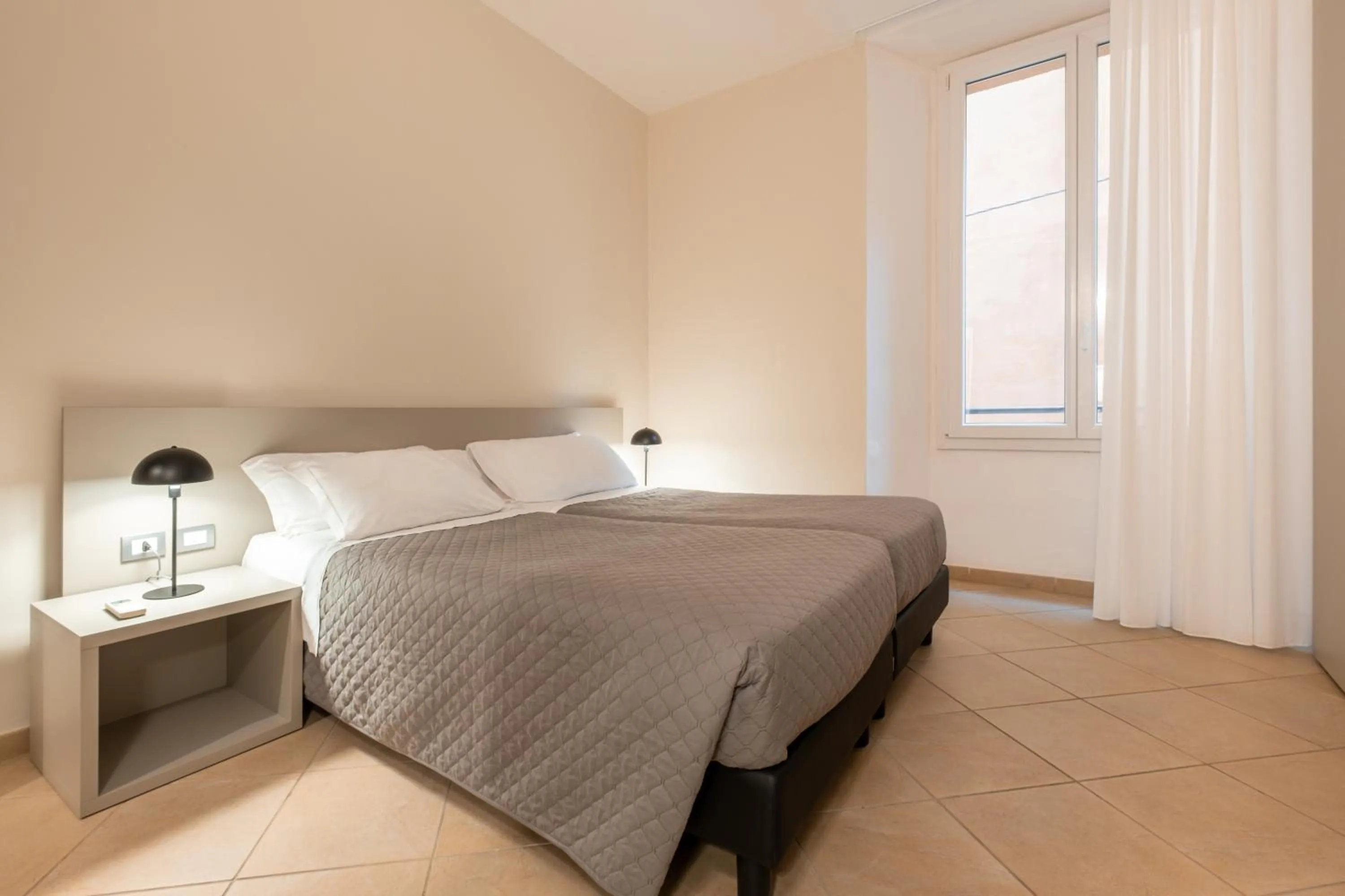 Bed in Residenza Ariosto by Studio Vita