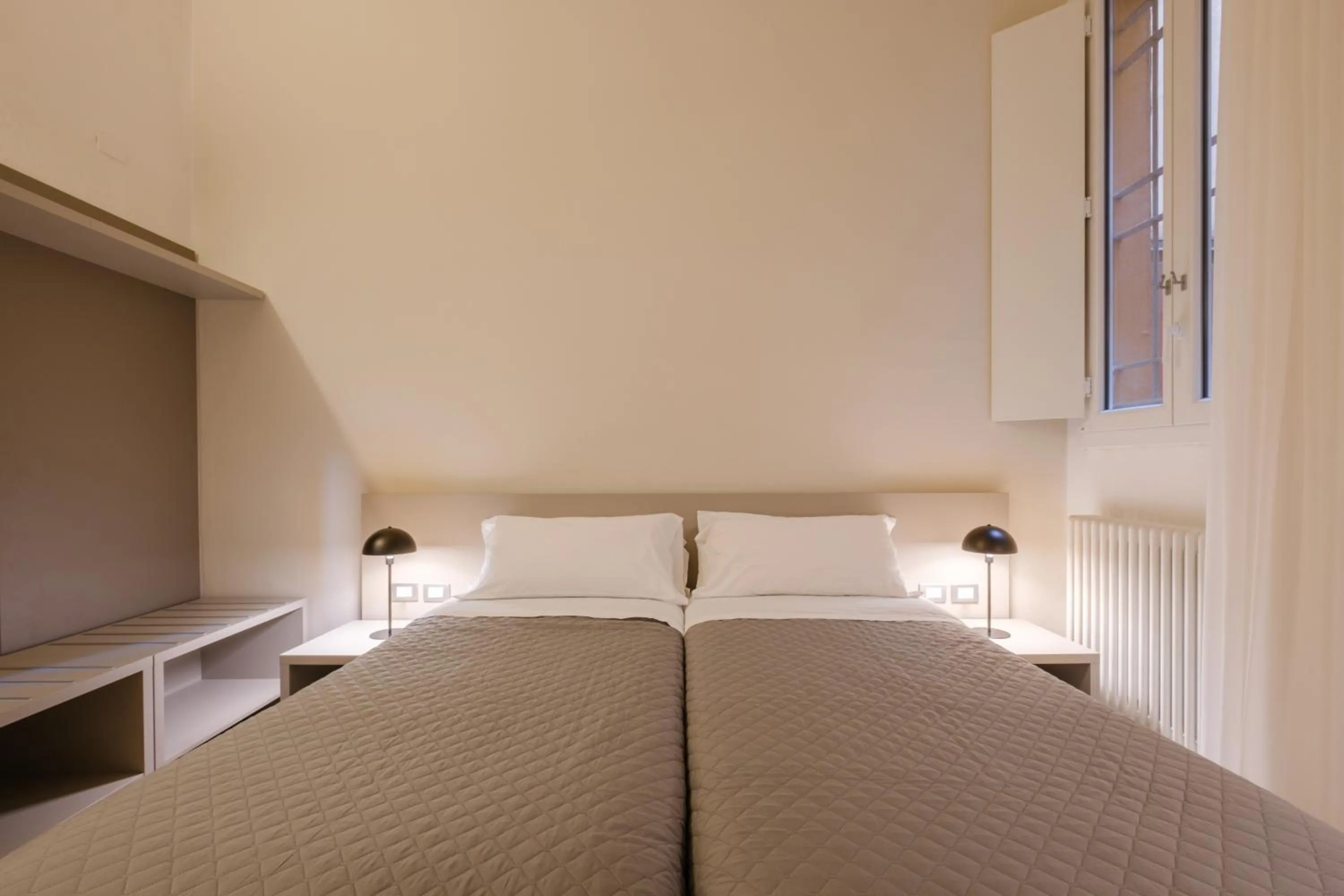 Bed in Residenza Ariosto by Studio Vita