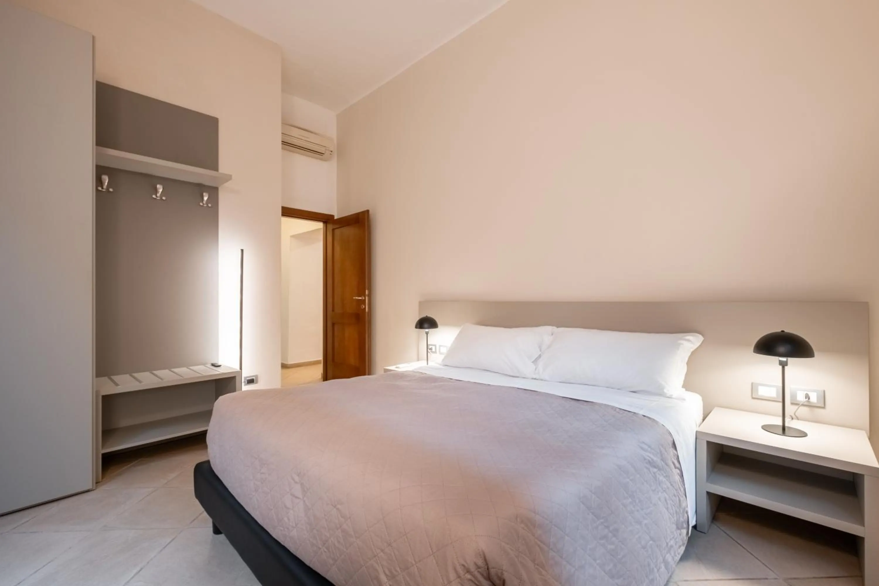 Bed in Residenza Ariosto by Studio Vita