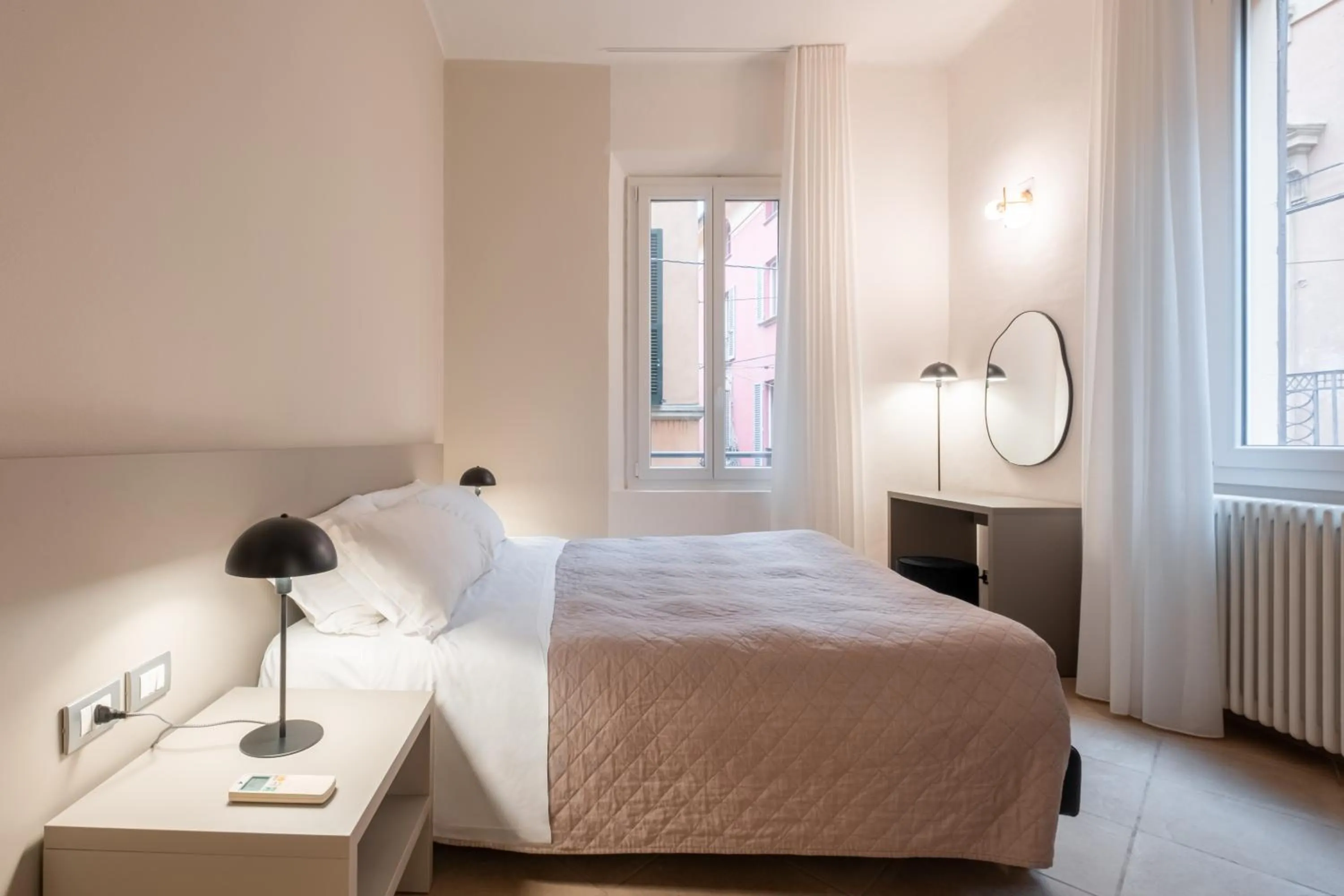Bed in Residenza Ariosto by Studio Vita