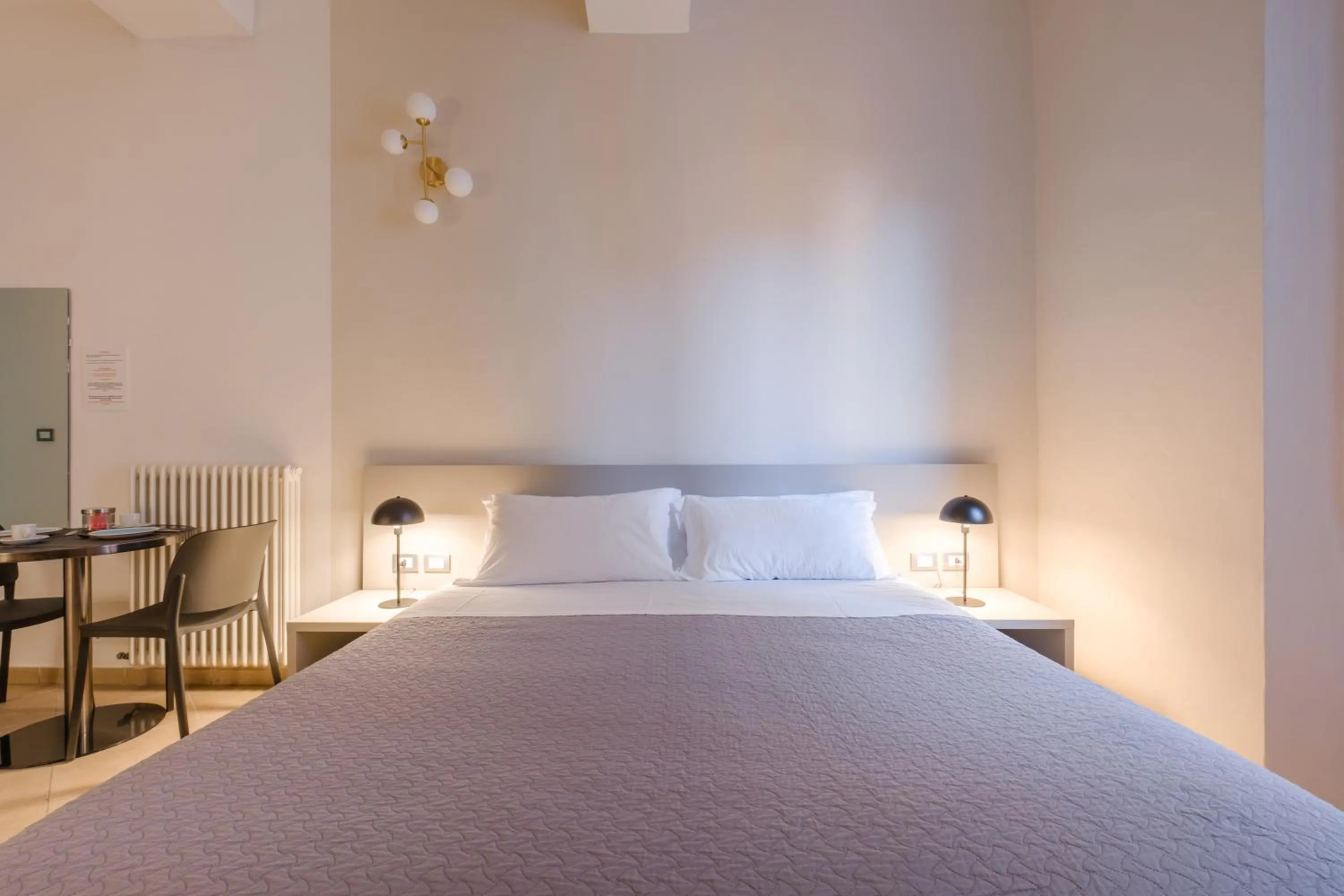 Bed in Residenza Ariosto by Studio Vita