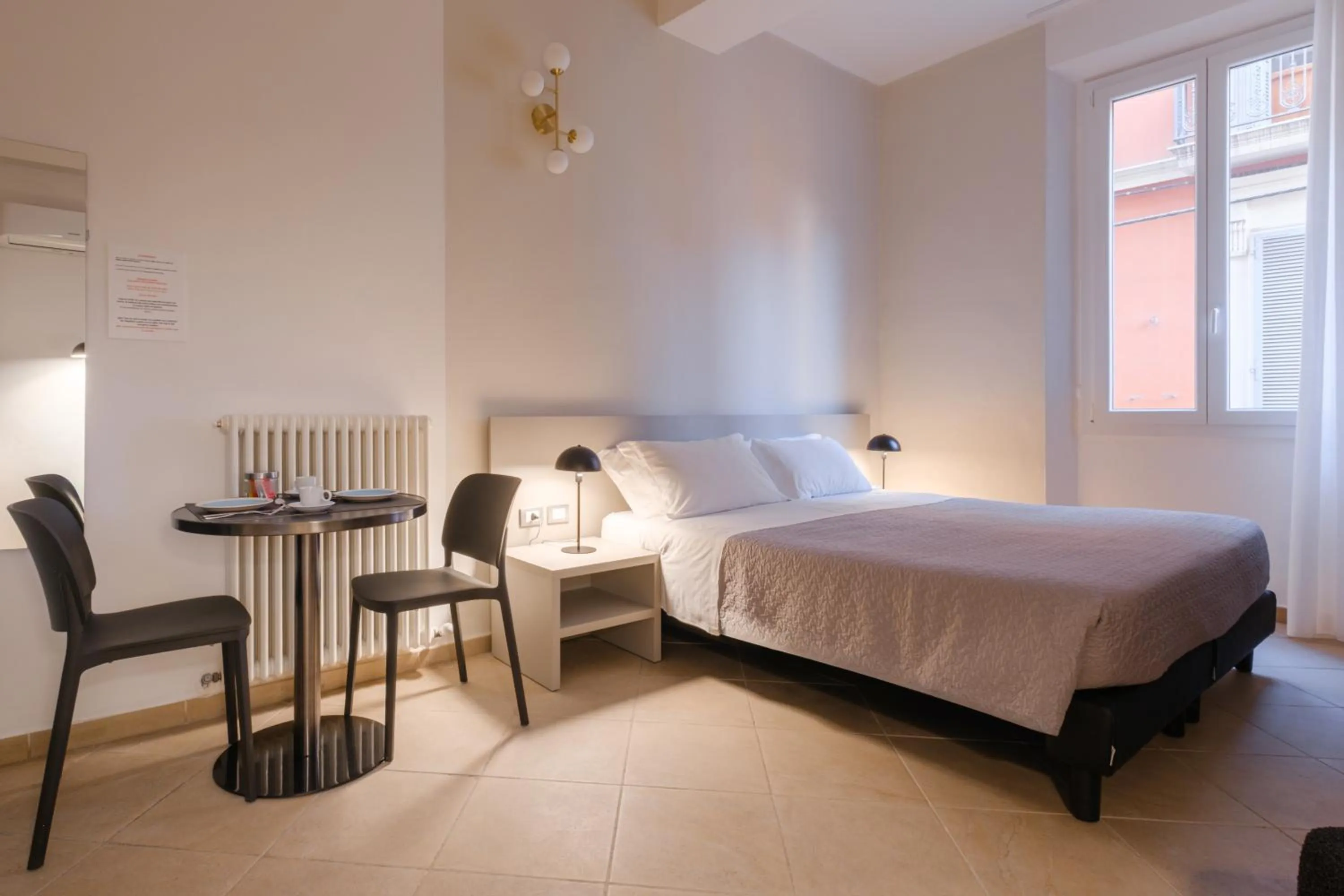 Bed in Residenza Ariosto by Studio Vita