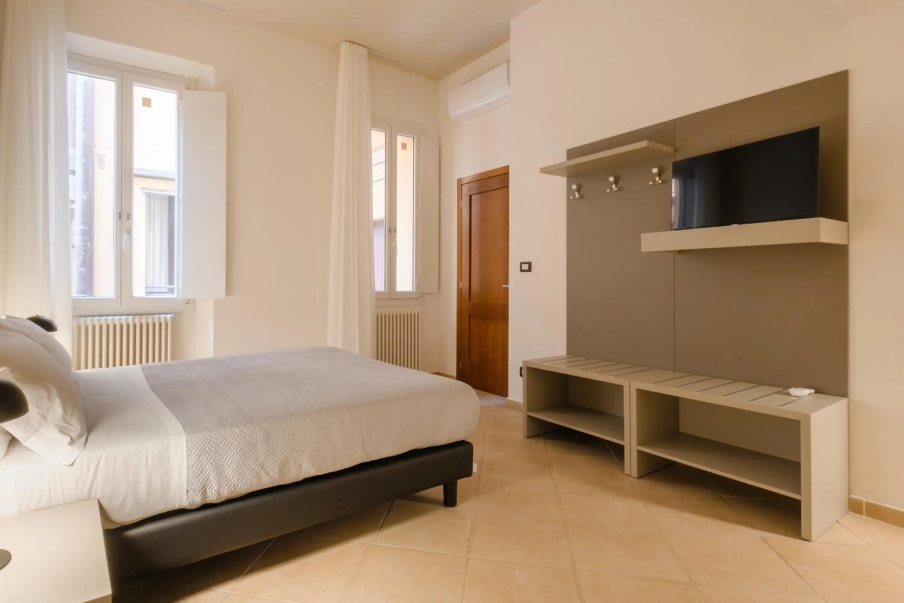 Bed in Residenza Ariosto by Studio Vita