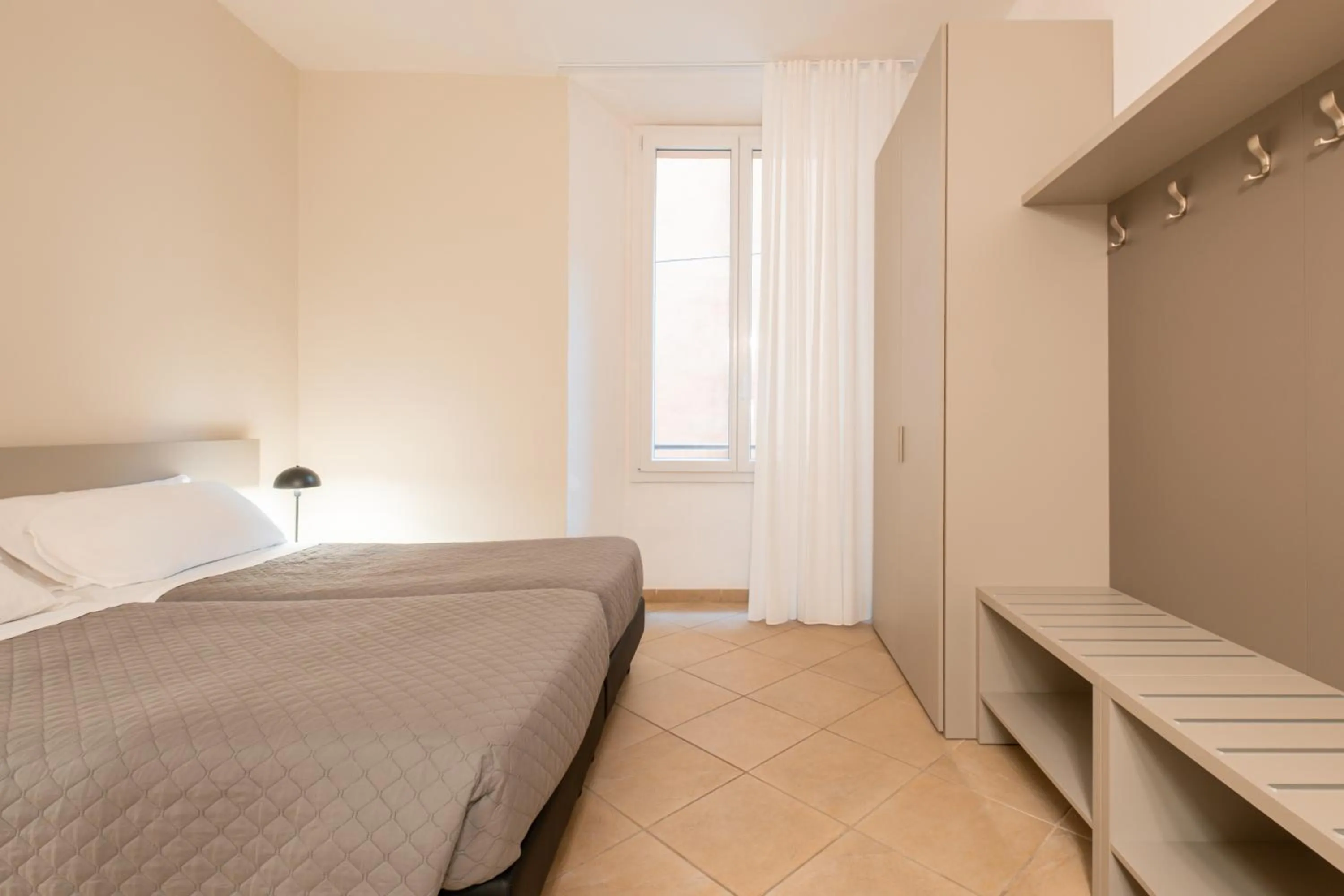 Bed in Residenza Ariosto by Studio Vita