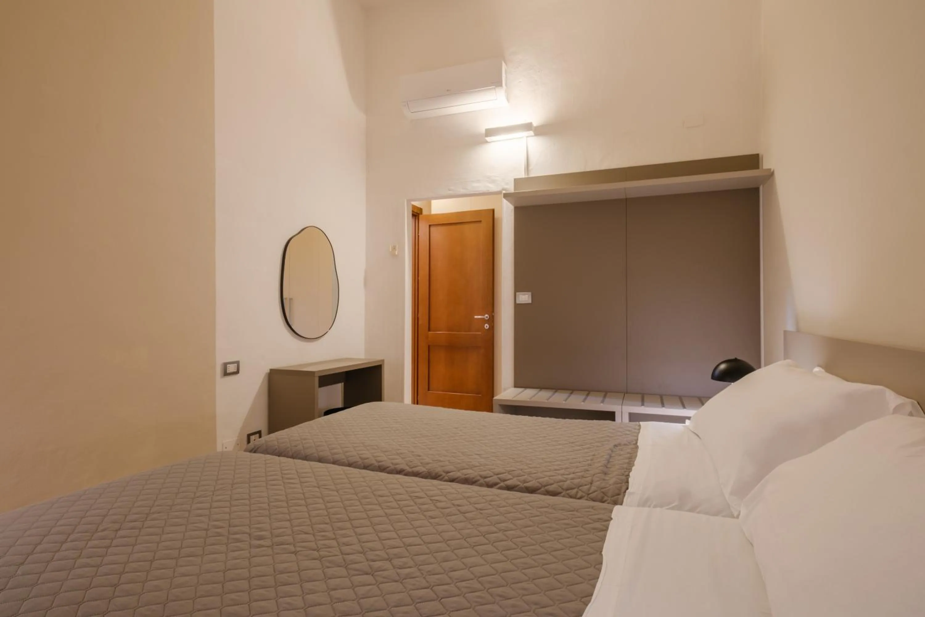 Bed in Residenza Ariosto by Studio Vita