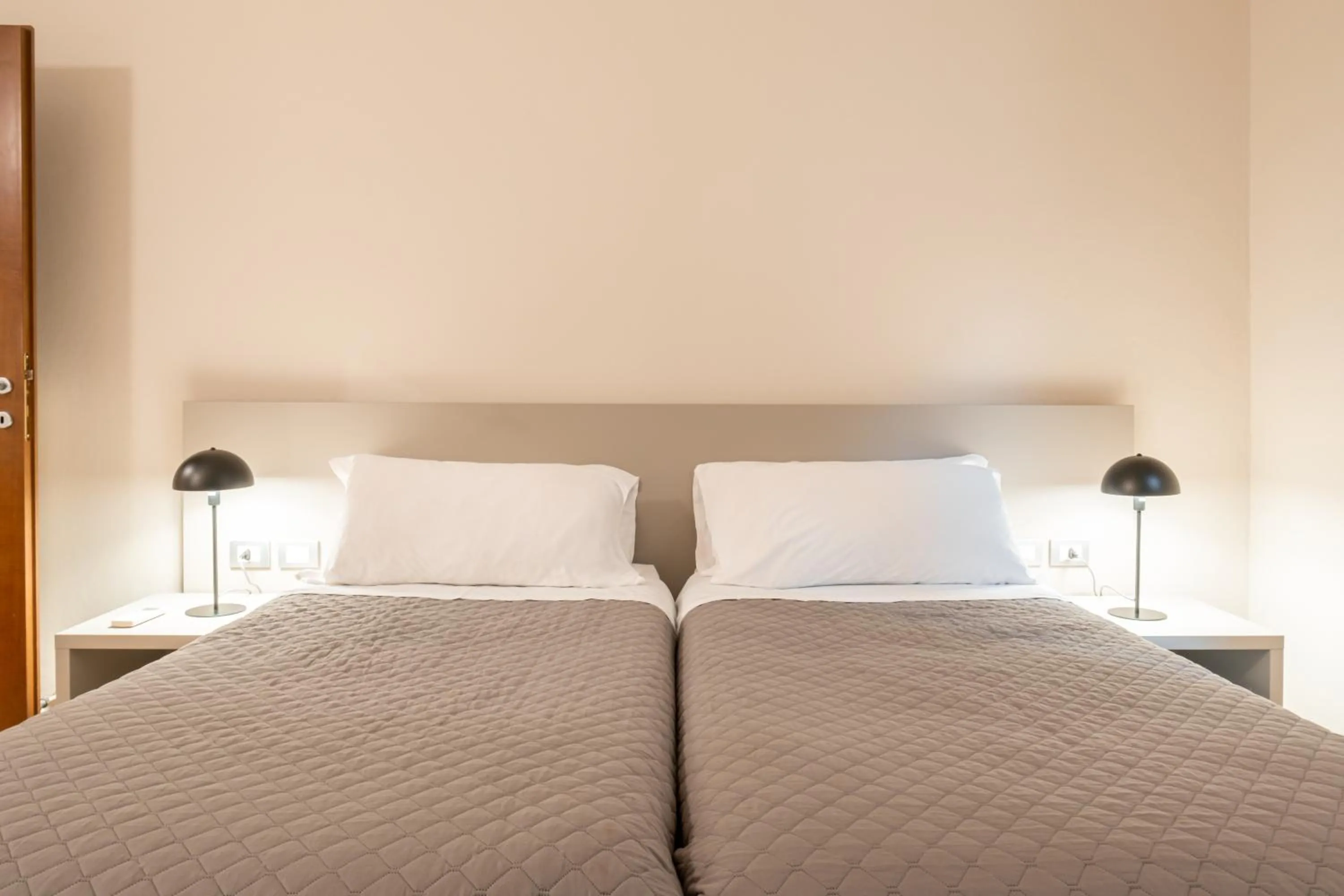 Bed in Residenza Ariosto by Studio Vita