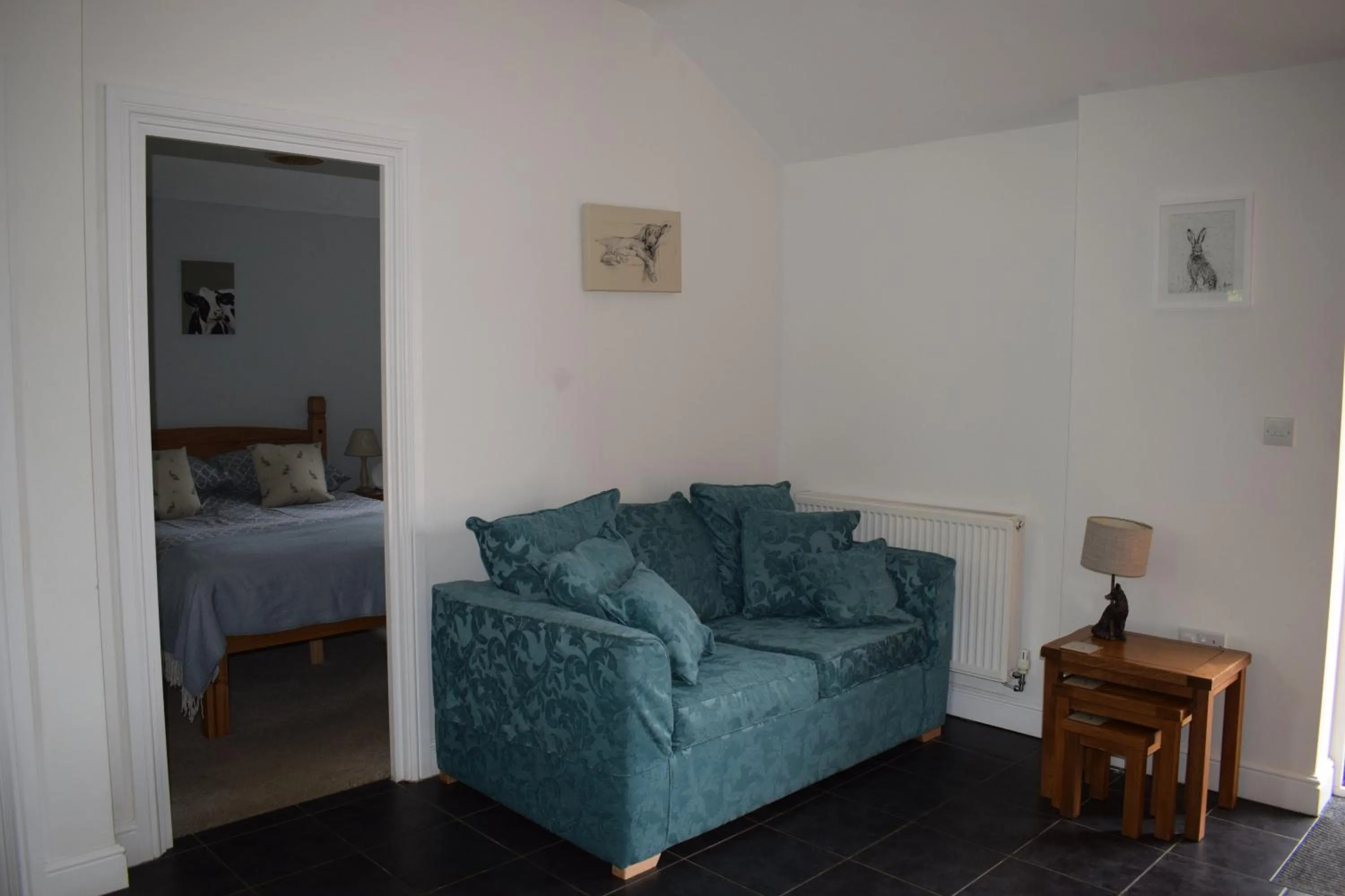 Living room, Bed in Upper Wood End Farm Holiday Cottages