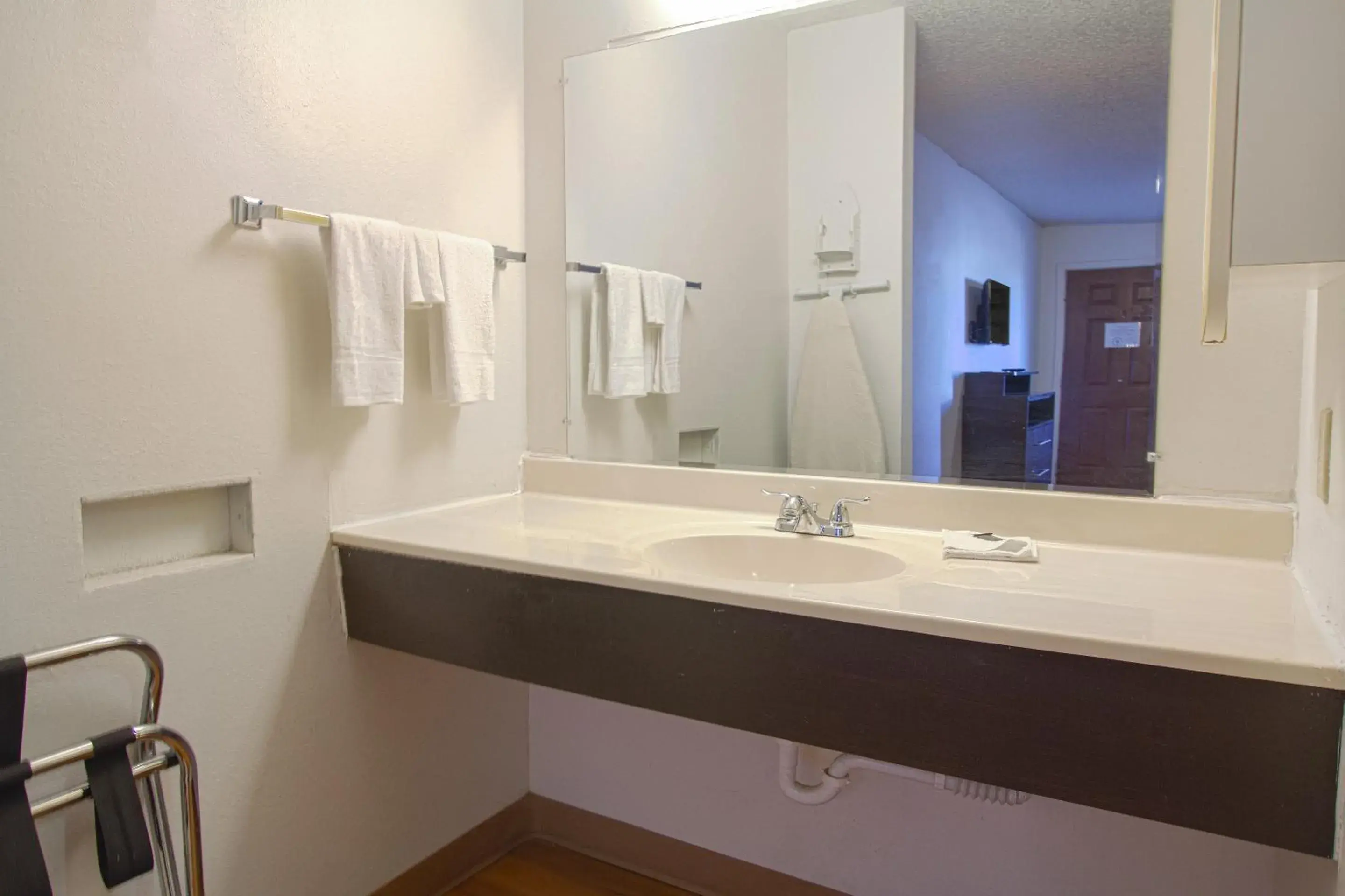 Bathroom in Studio Inn Extended Stay Oklahoma City Airport by OYO