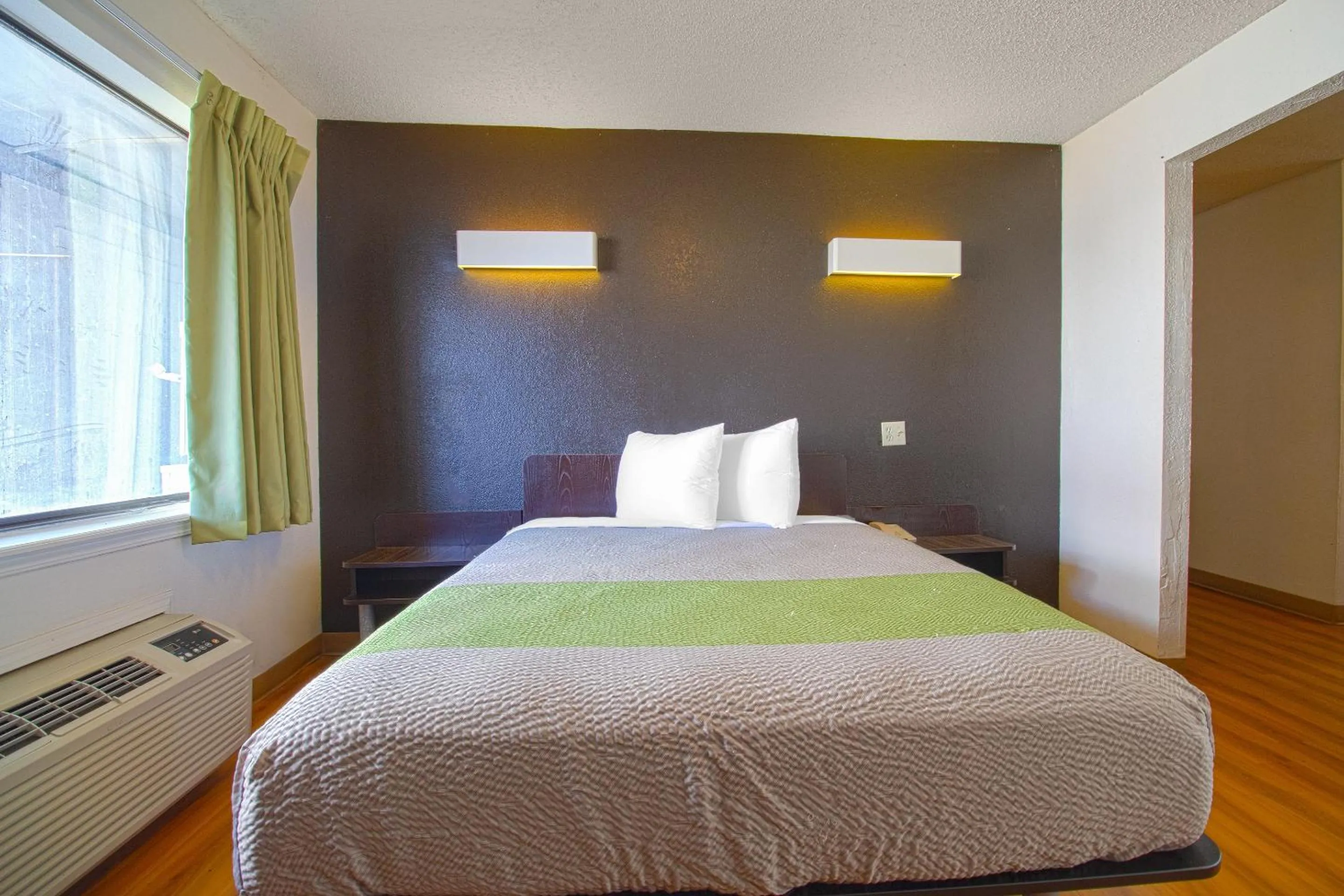 Bedroom in Studio Inn Extended Stay Oklahoma City Airport by OYO