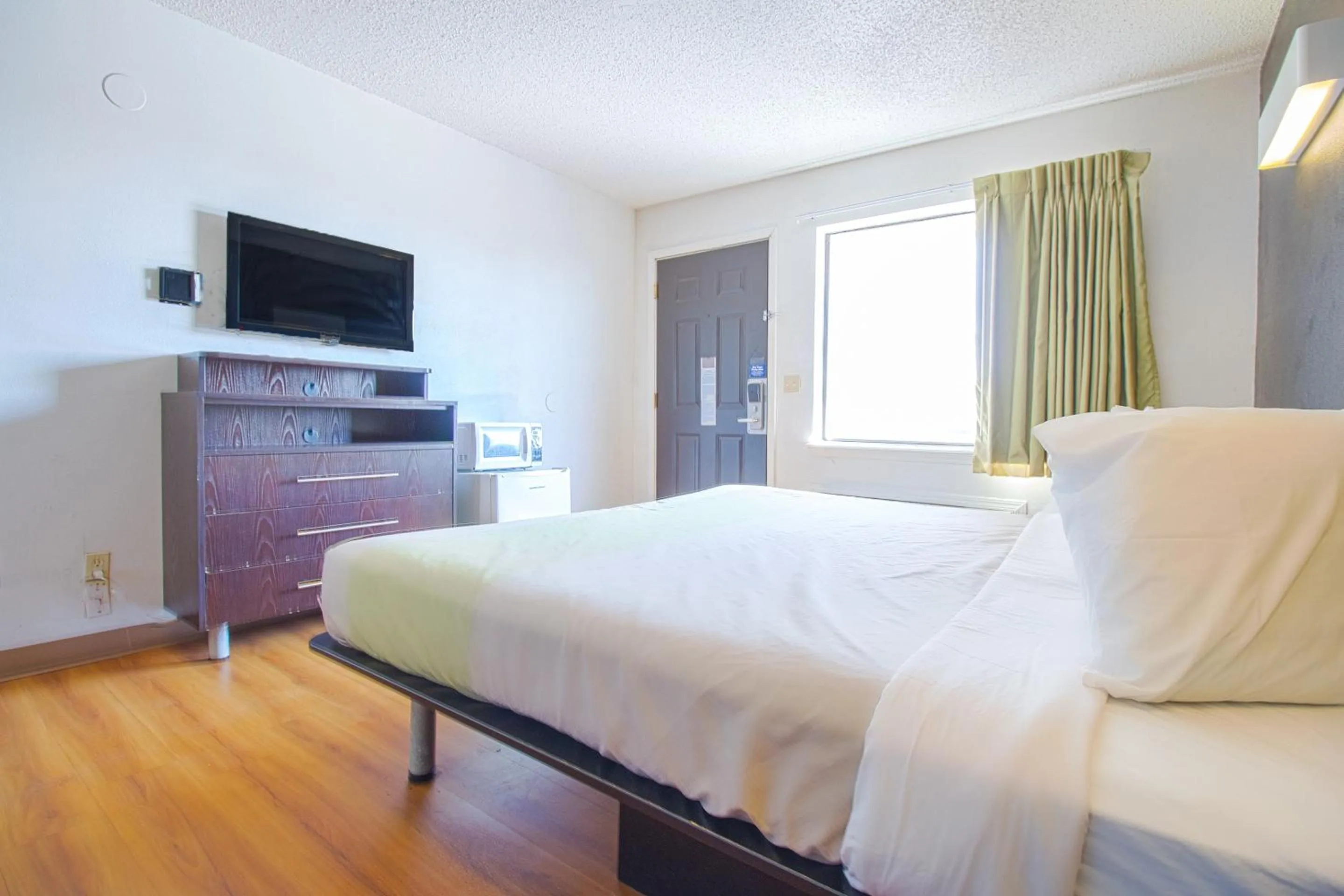 Bedroom in Studio Inn Extended Stay Oklahoma City Airport by OYO