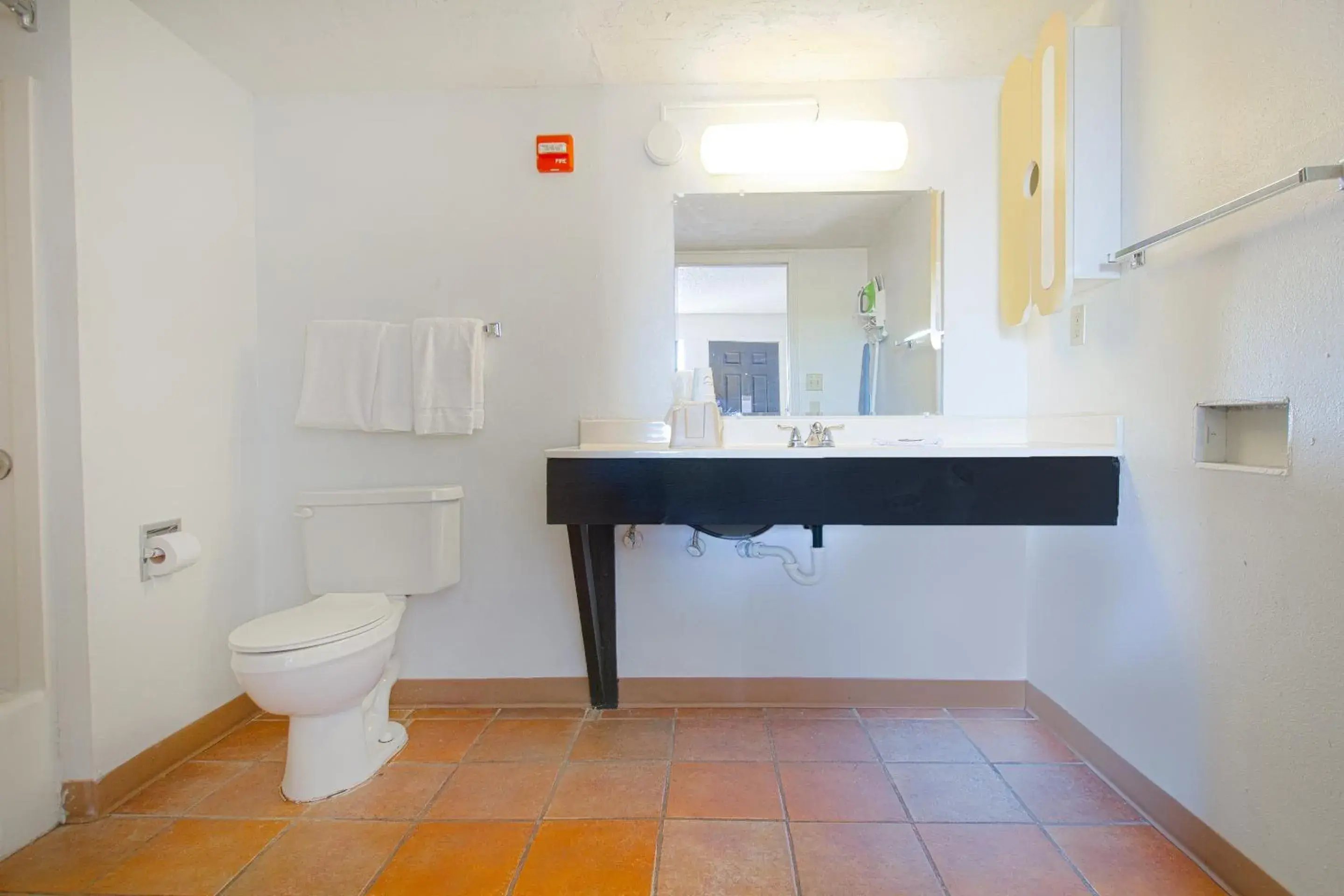 Bathroom in Studio Inn Extended Stay Oklahoma City Airport by OYO