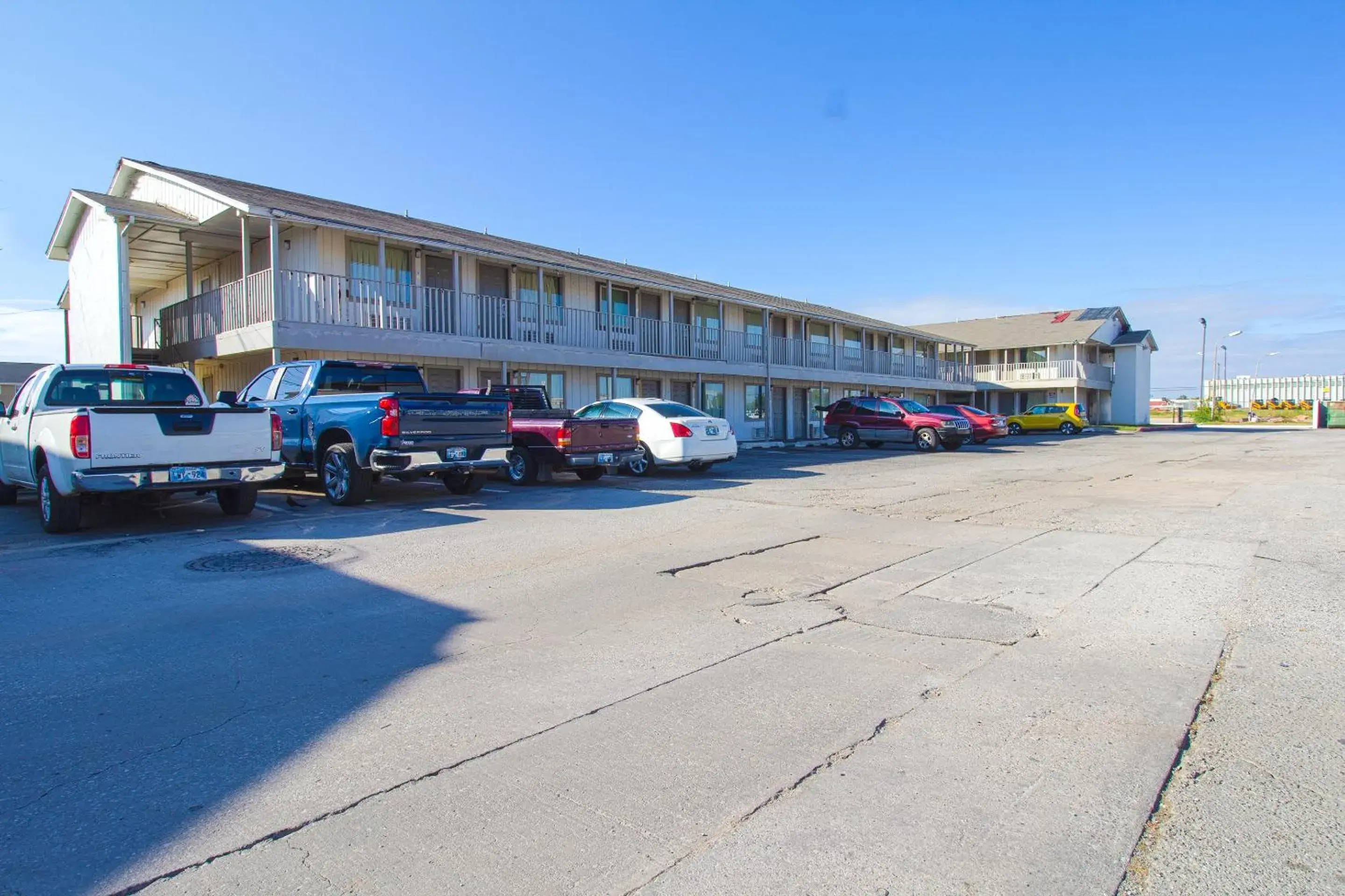 Parking, Property Building in Studio Inn Extended Stay Oklahoma City Airport by OYO