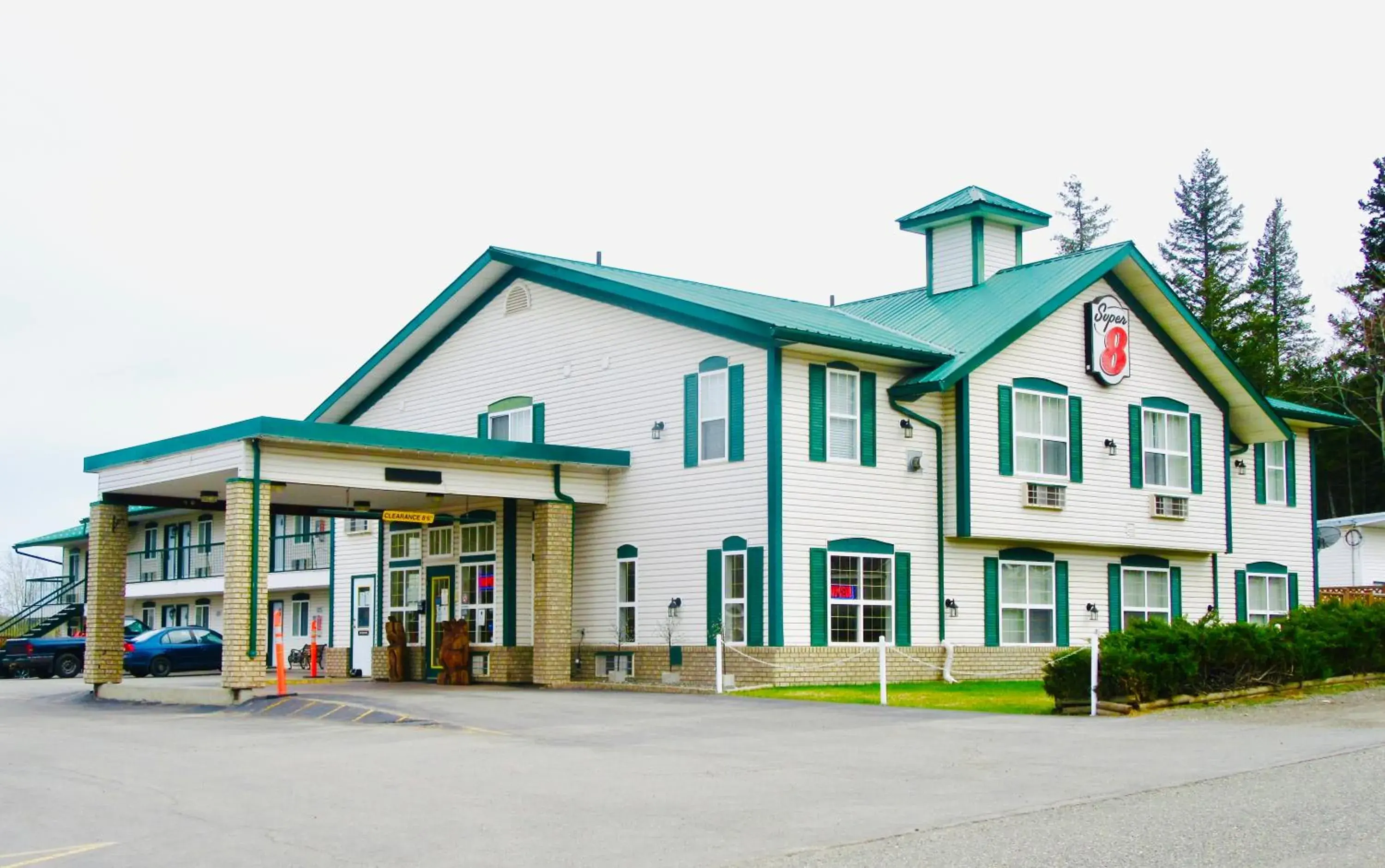 Property building in Super 8 by Wyndham 100 Mile House Property building in Super 8 by Wyndham 100 Mile House