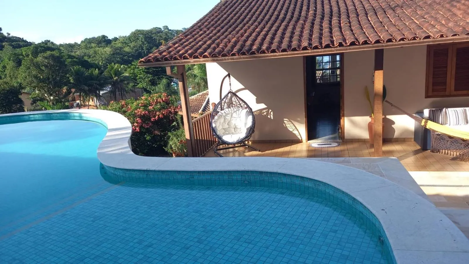 Swimming pool in Pousada dos Navegantes