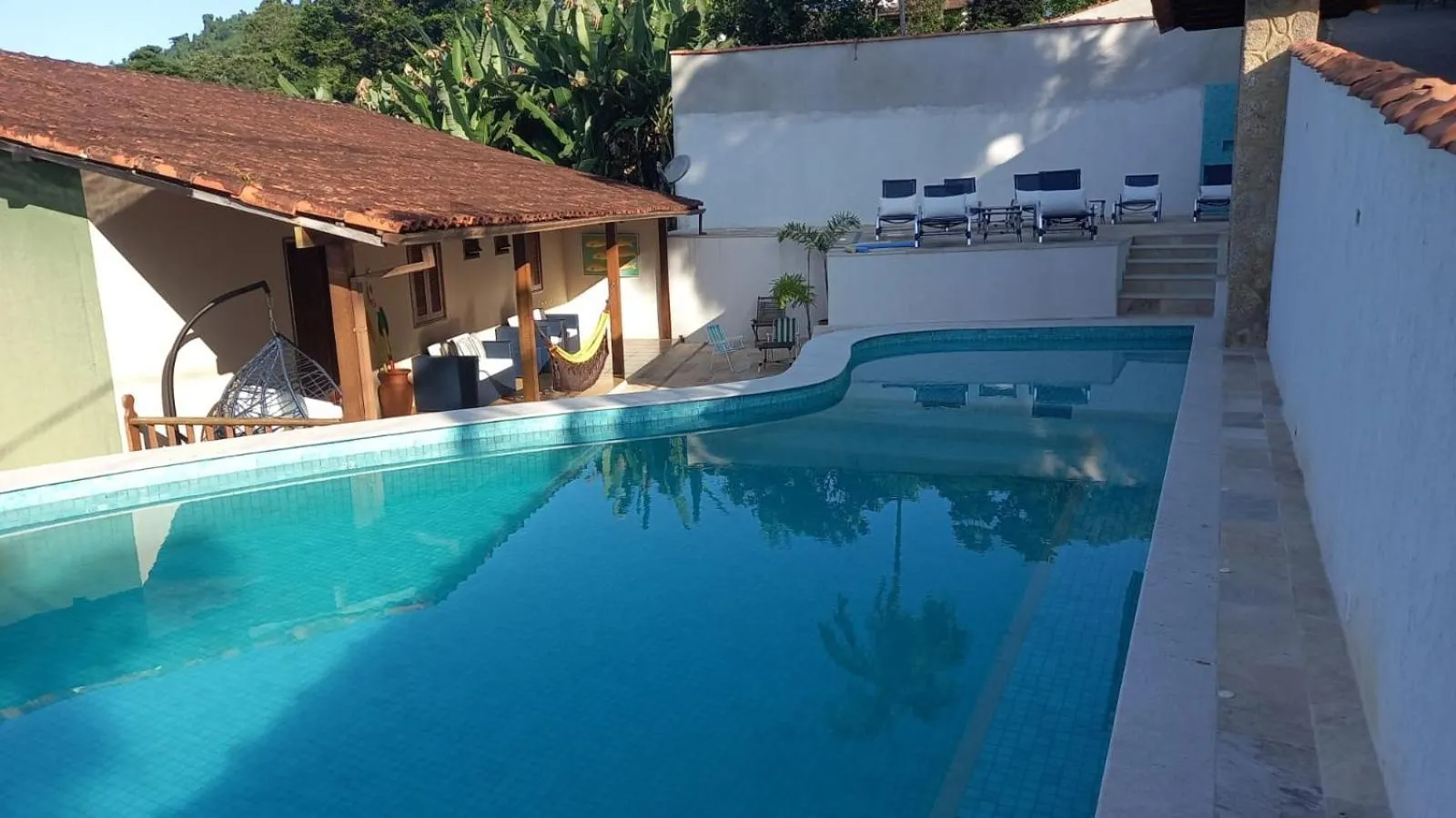 Swimming pool in Pousada dos Navegantes