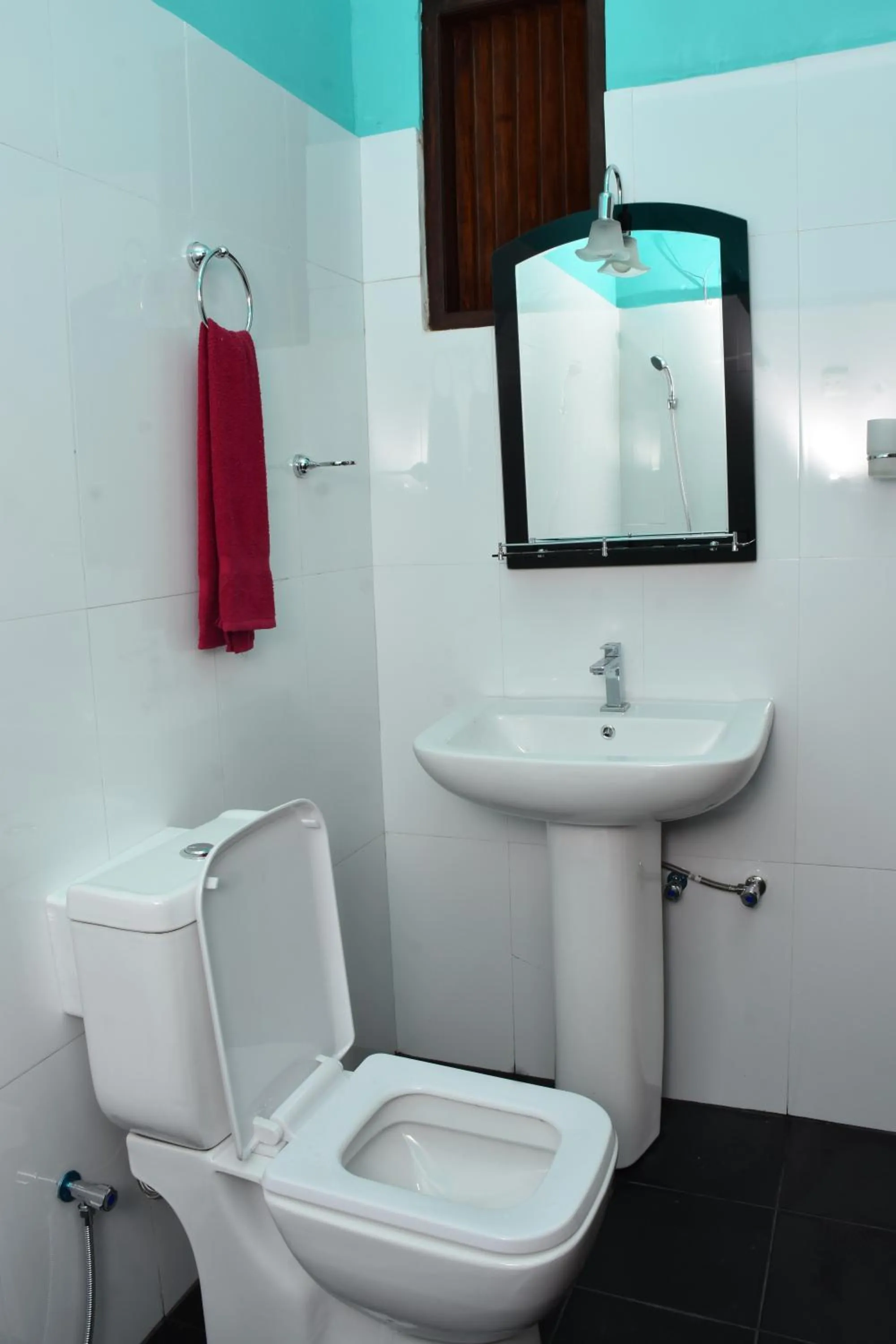 Toilet in Grand View Guest House