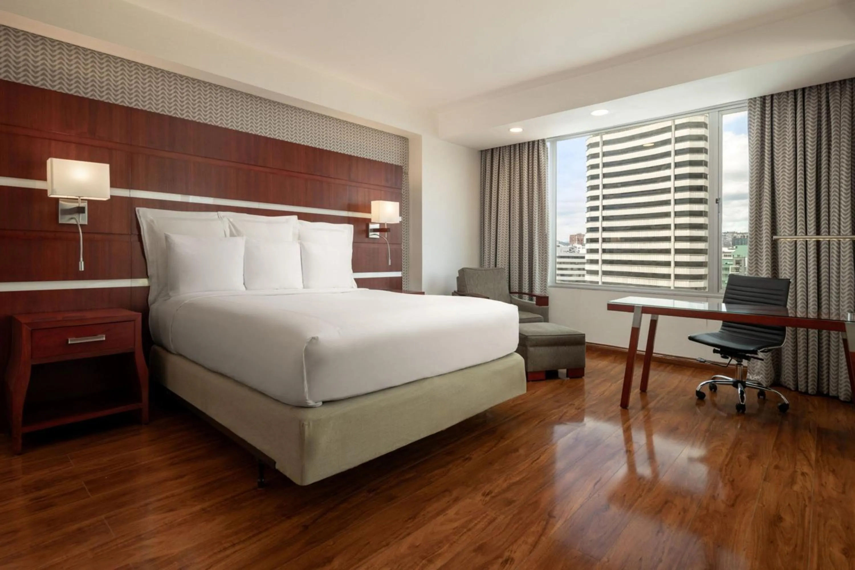 Photo of the whole room, Bed in JW Marriott Quito