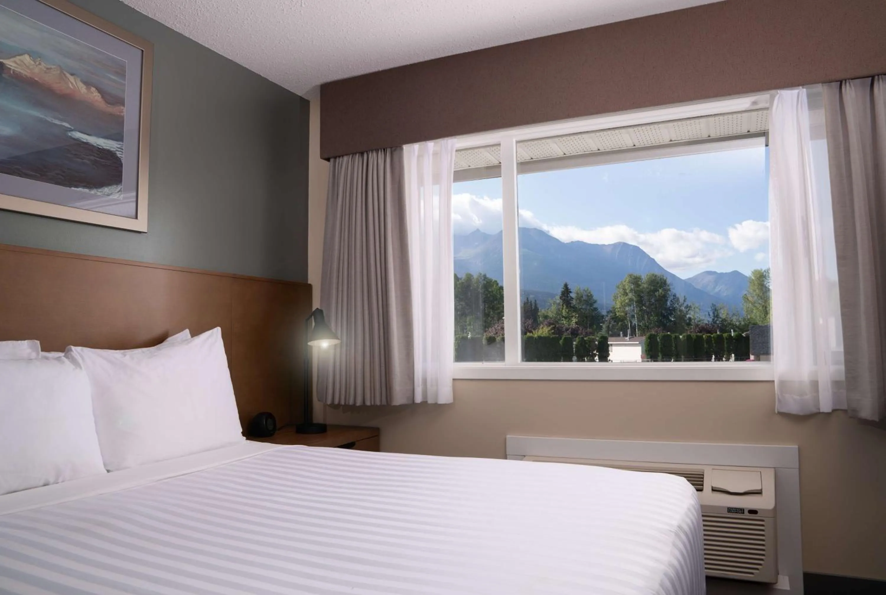 Bedroom, Bed in Prestige Hudson Bay Lodge & Conference Centre, WorldHotels Crafted Collection