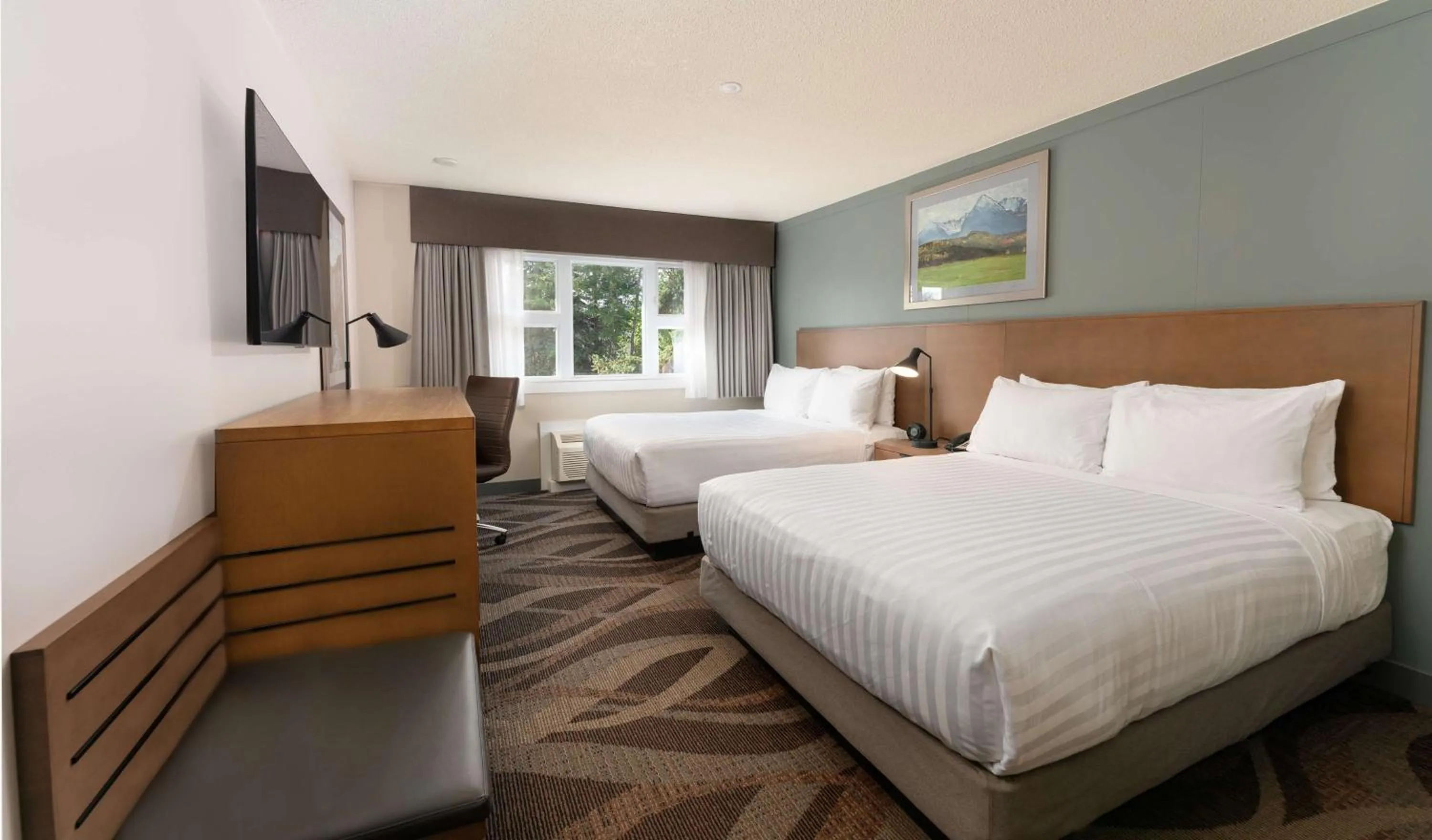 Bedroom, Bed in Prestige Hudson Bay Lodge & Conference Centre, WorldHotels Crafted Collection
