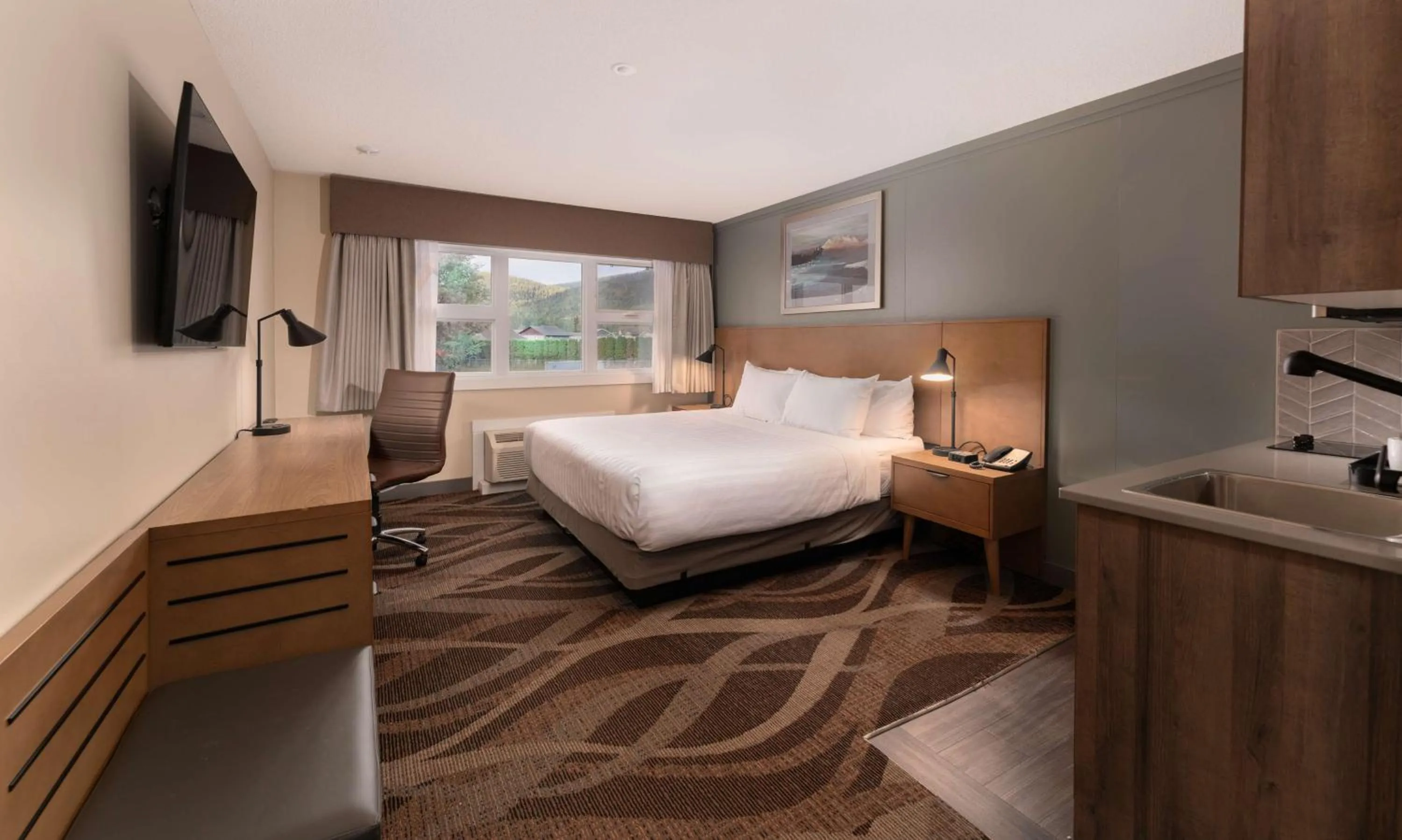 Bedroom, Bed in Prestige Hudson Bay Lodge & Conference Centre, WorldHotels Crafted Collection