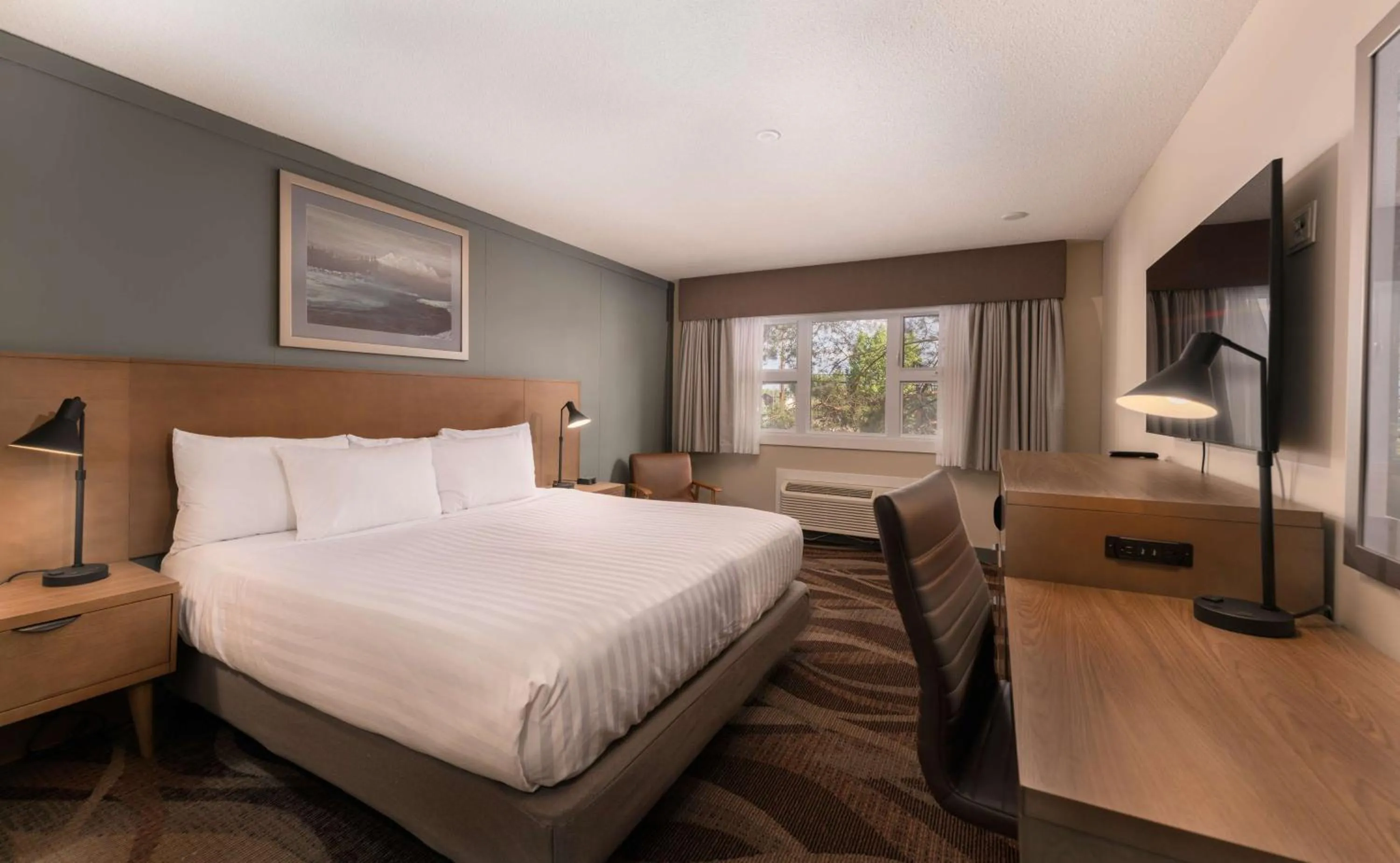 Bedroom, Bed in Prestige Hudson Bay Lodge & Conference Centre, WorldHotels Crafted Collection