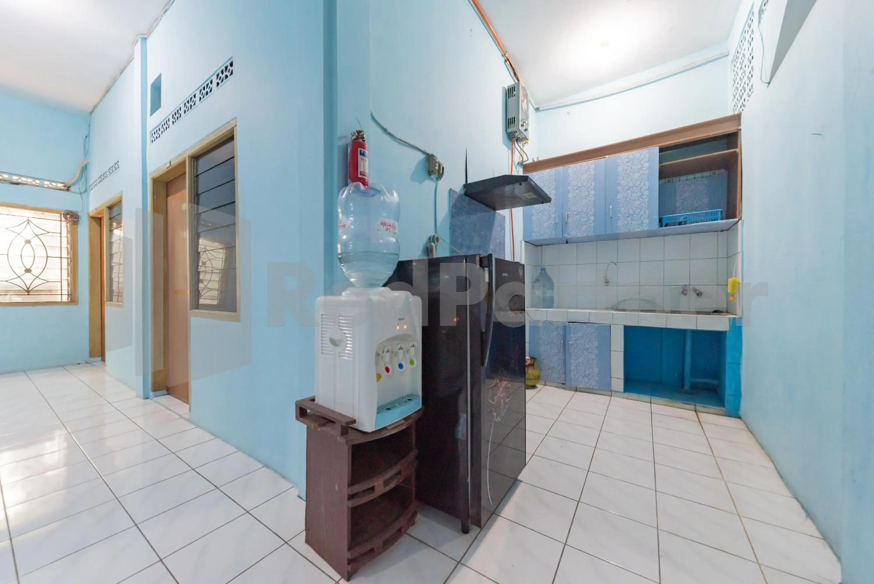 Kitchen or kitchenette in Grha Blue Sky Syariah RedPartner