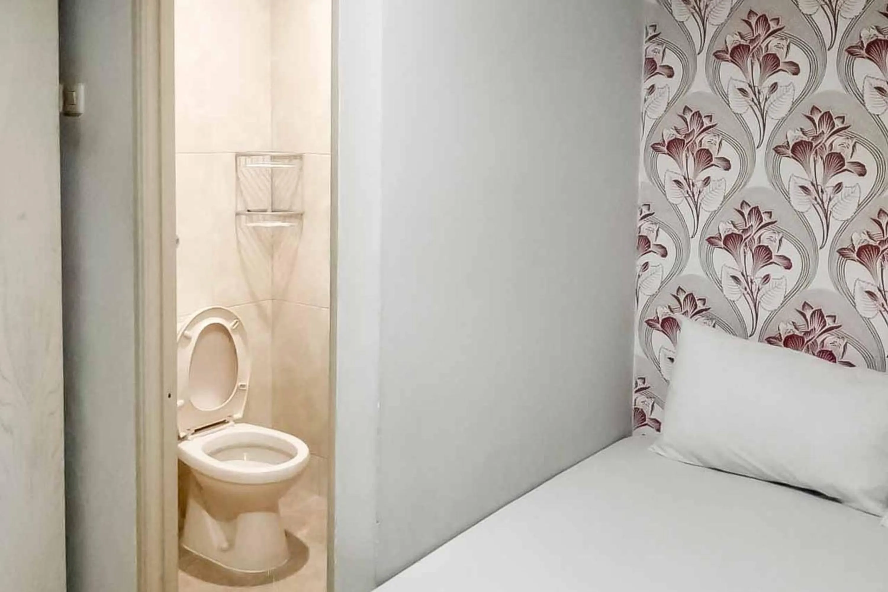 Bed in Rumahku Hayam Wuruk Mitra RedDoorz