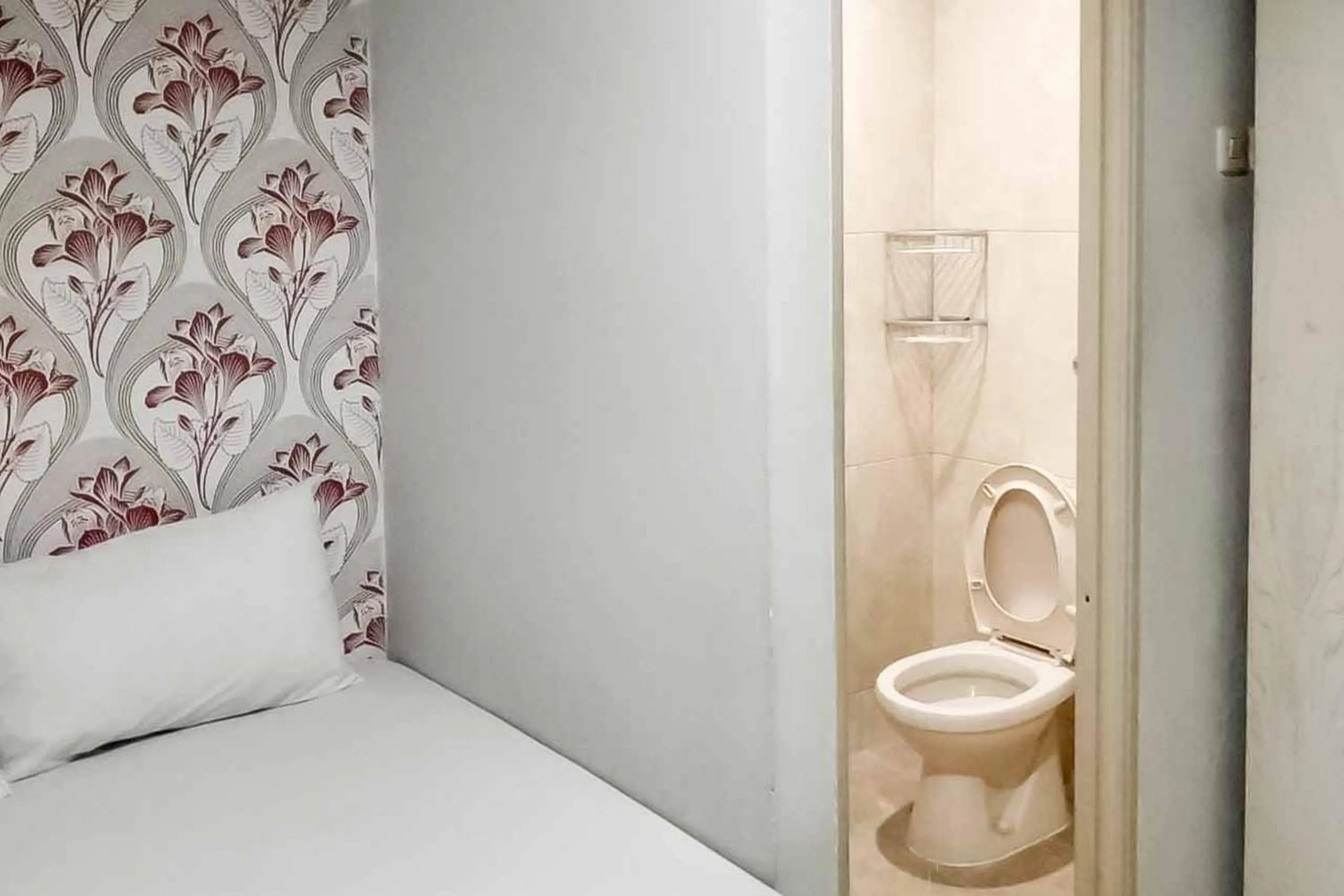 Bed in Rumahku Hayam Wuruk Mitra RedDoorz