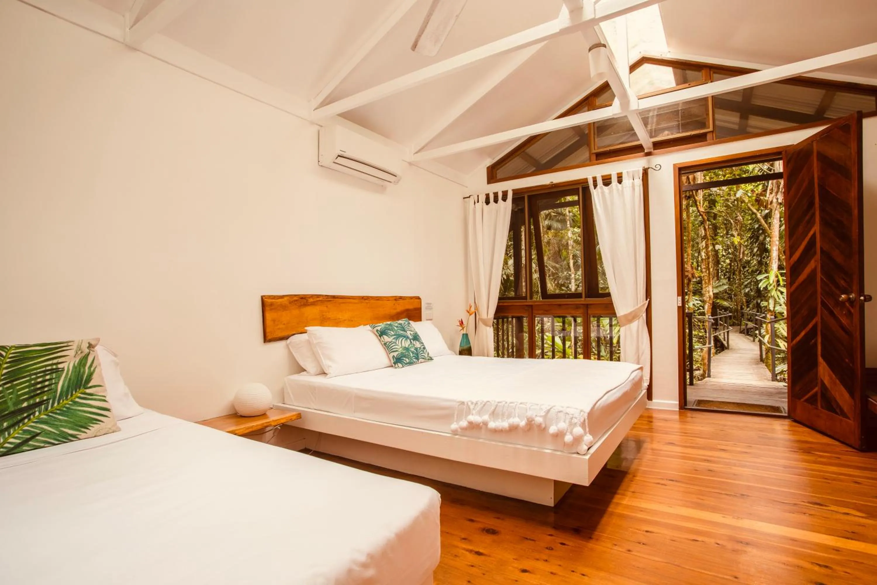 Bed in Daintree Wilderness Lodge