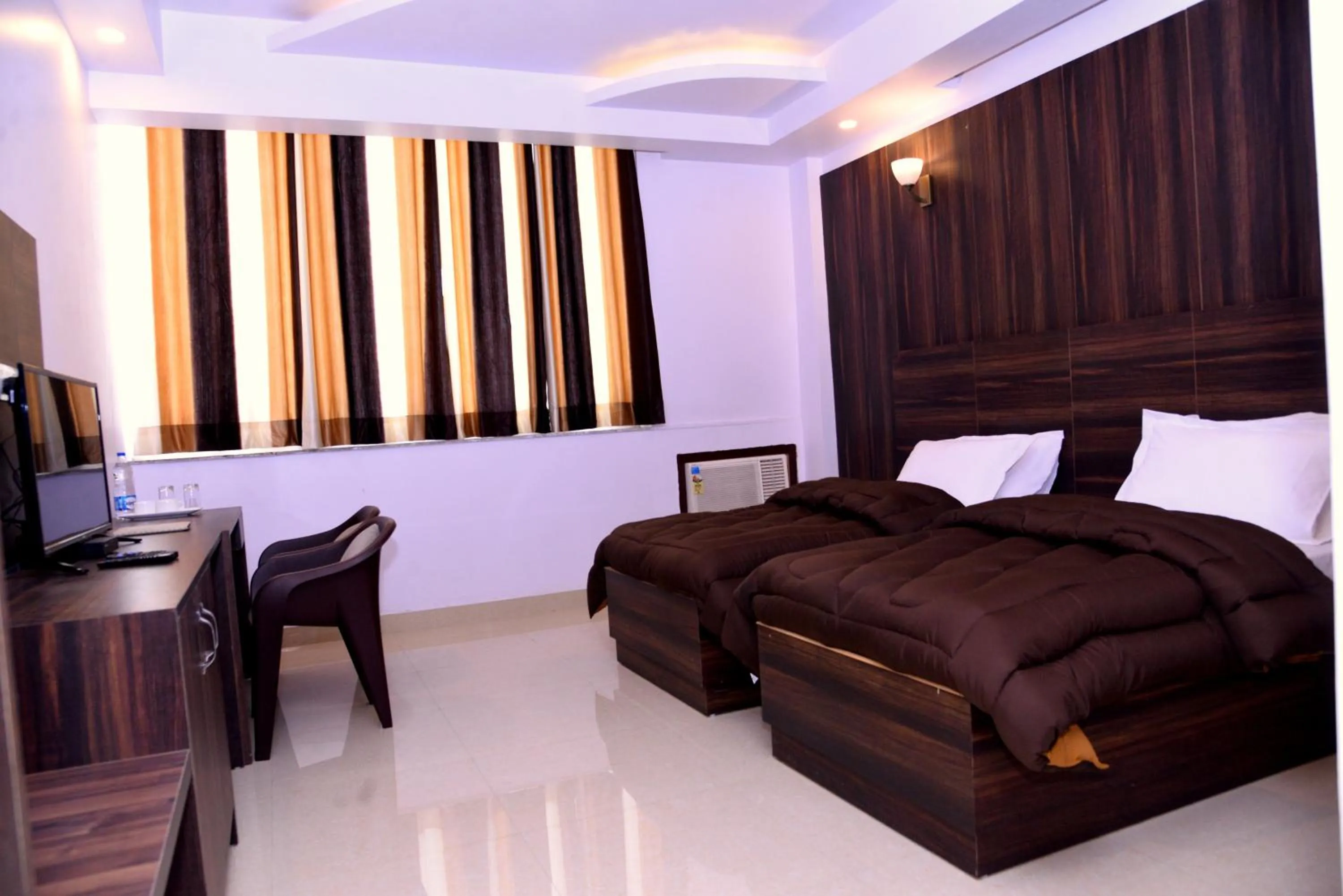 Photo of the whole room, Bed in The Ravindram Hotel