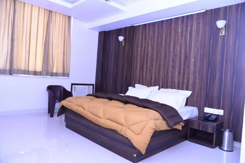 Bed in The Ravindram Hotel