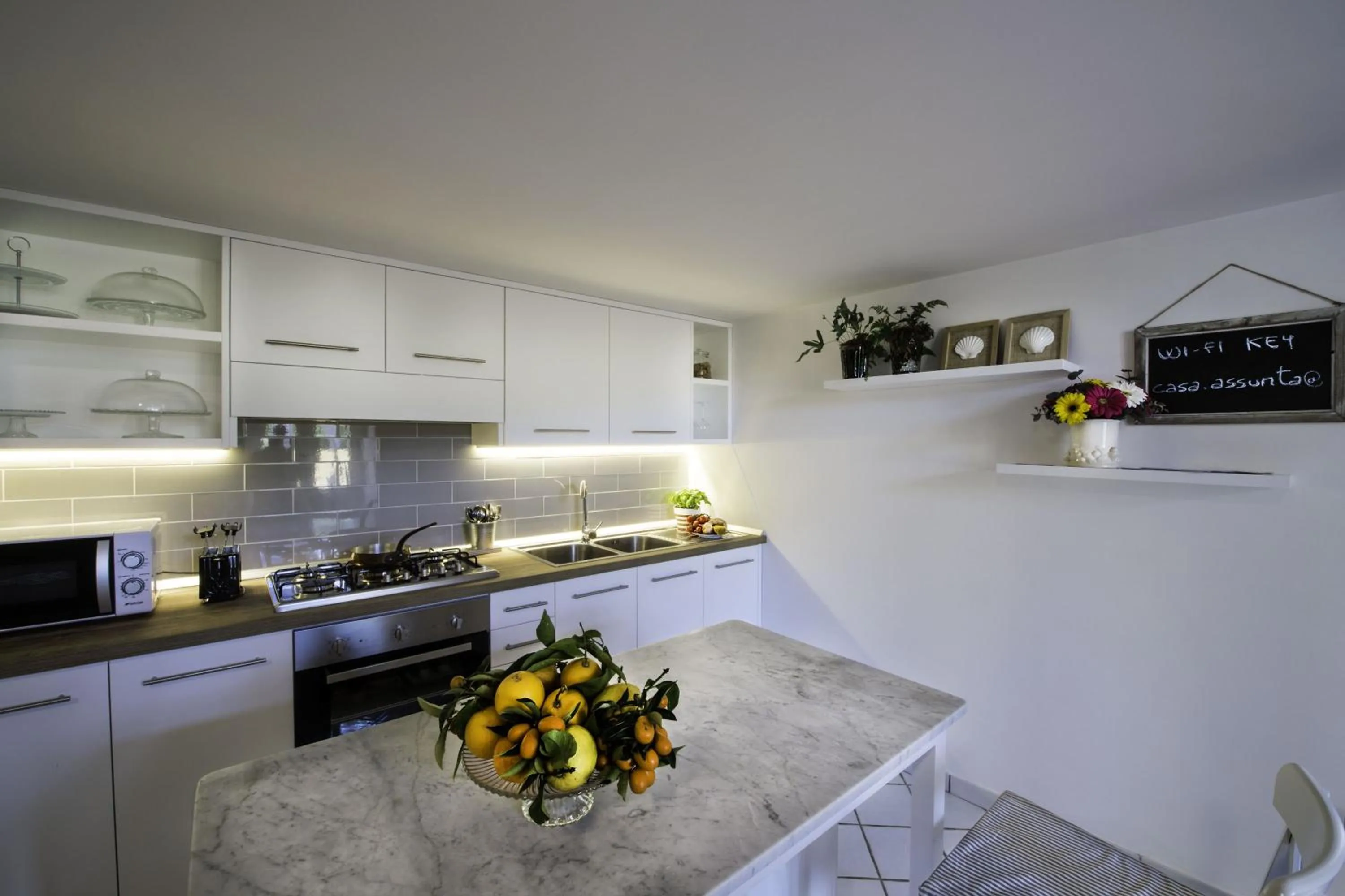 Kitchen or kitchenette in Casa Assunta B&B