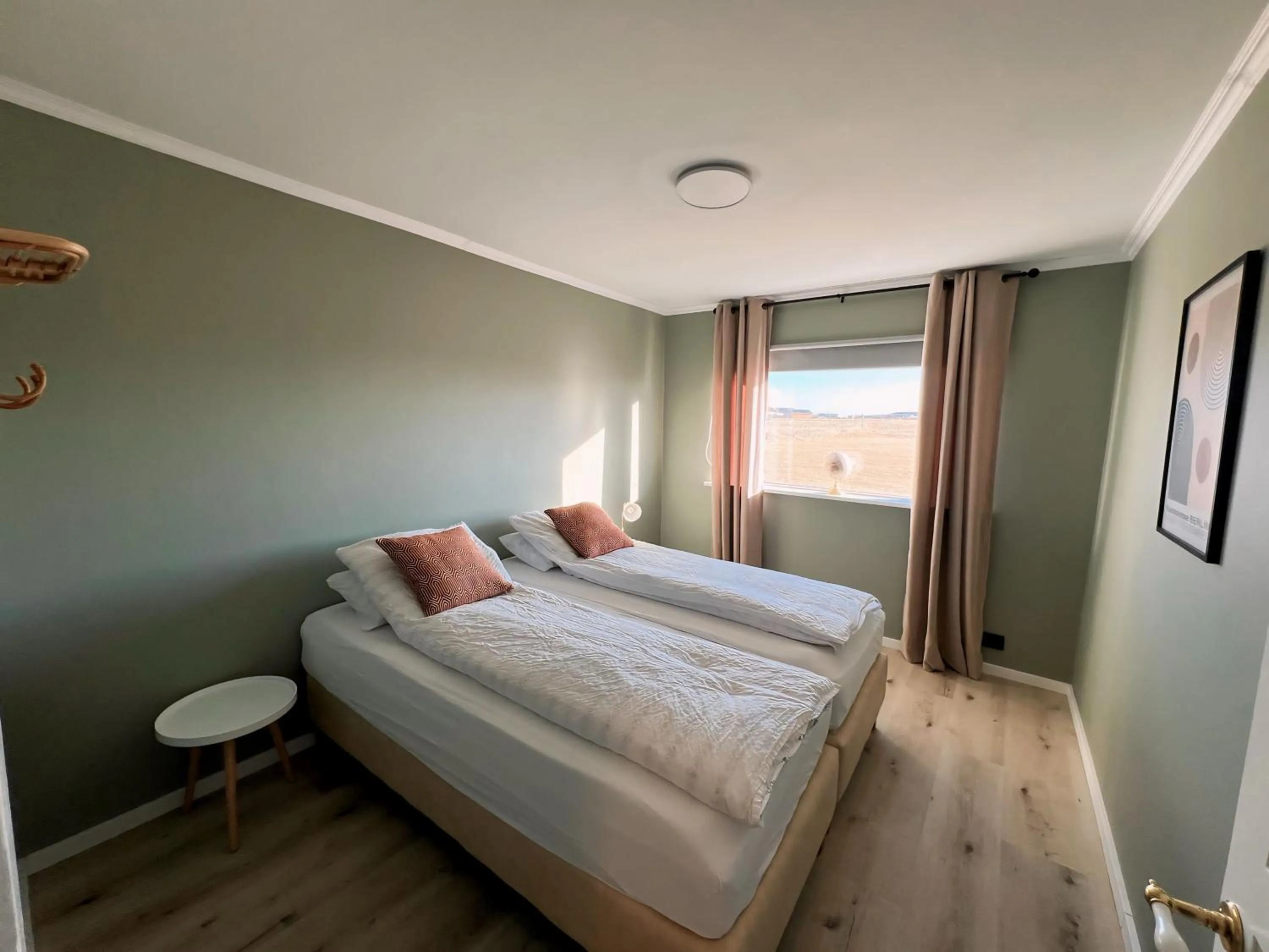 Bed in Garður Apartments