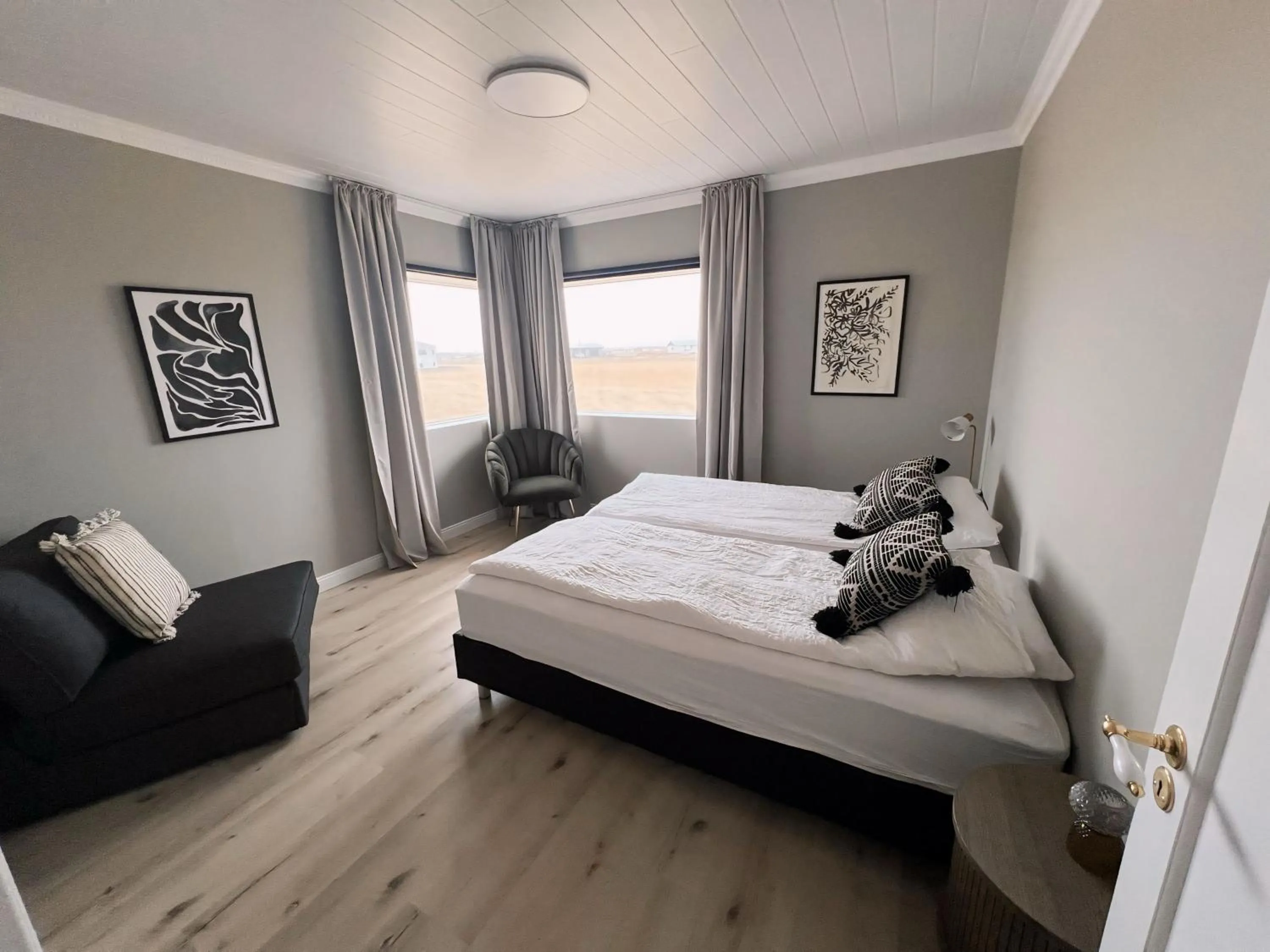 Bed in Garður Apartments