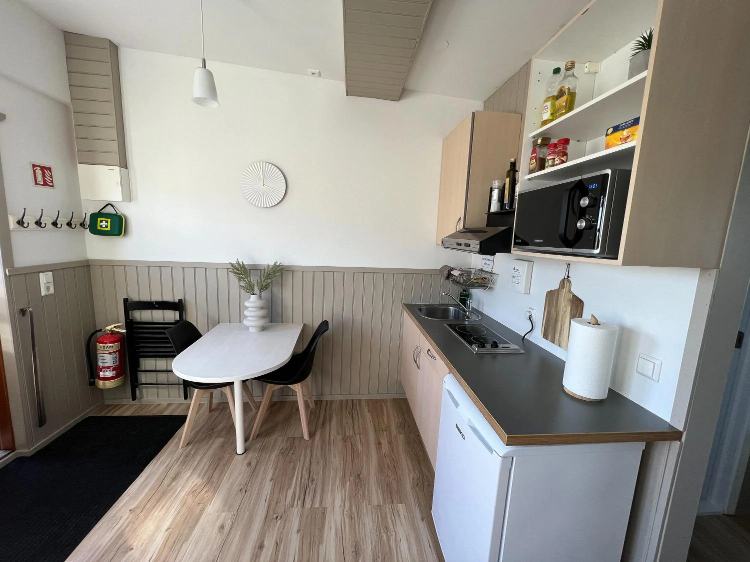 Kitchen or kitchenette in Garður Apartments