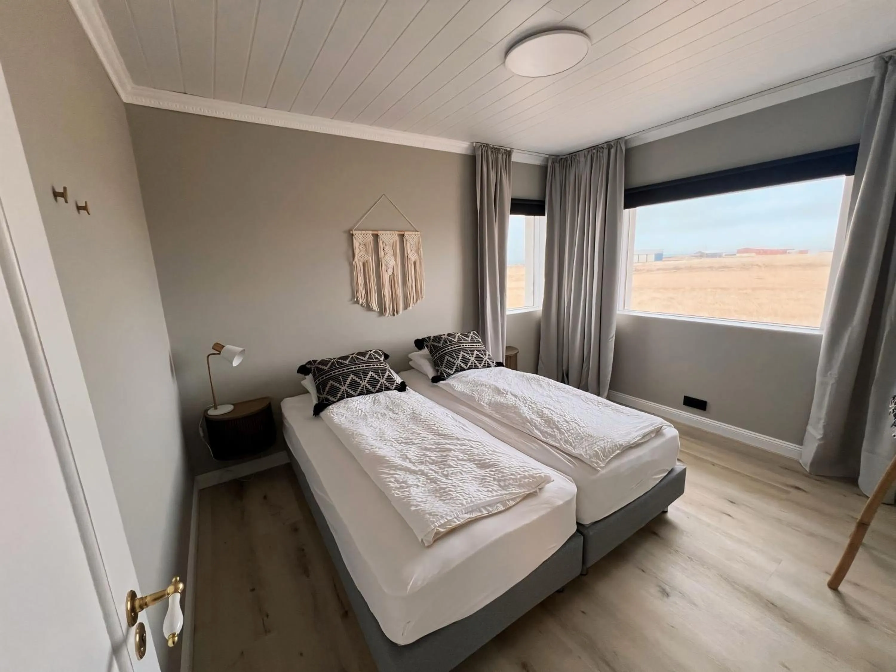 Bed in Garður Apartments