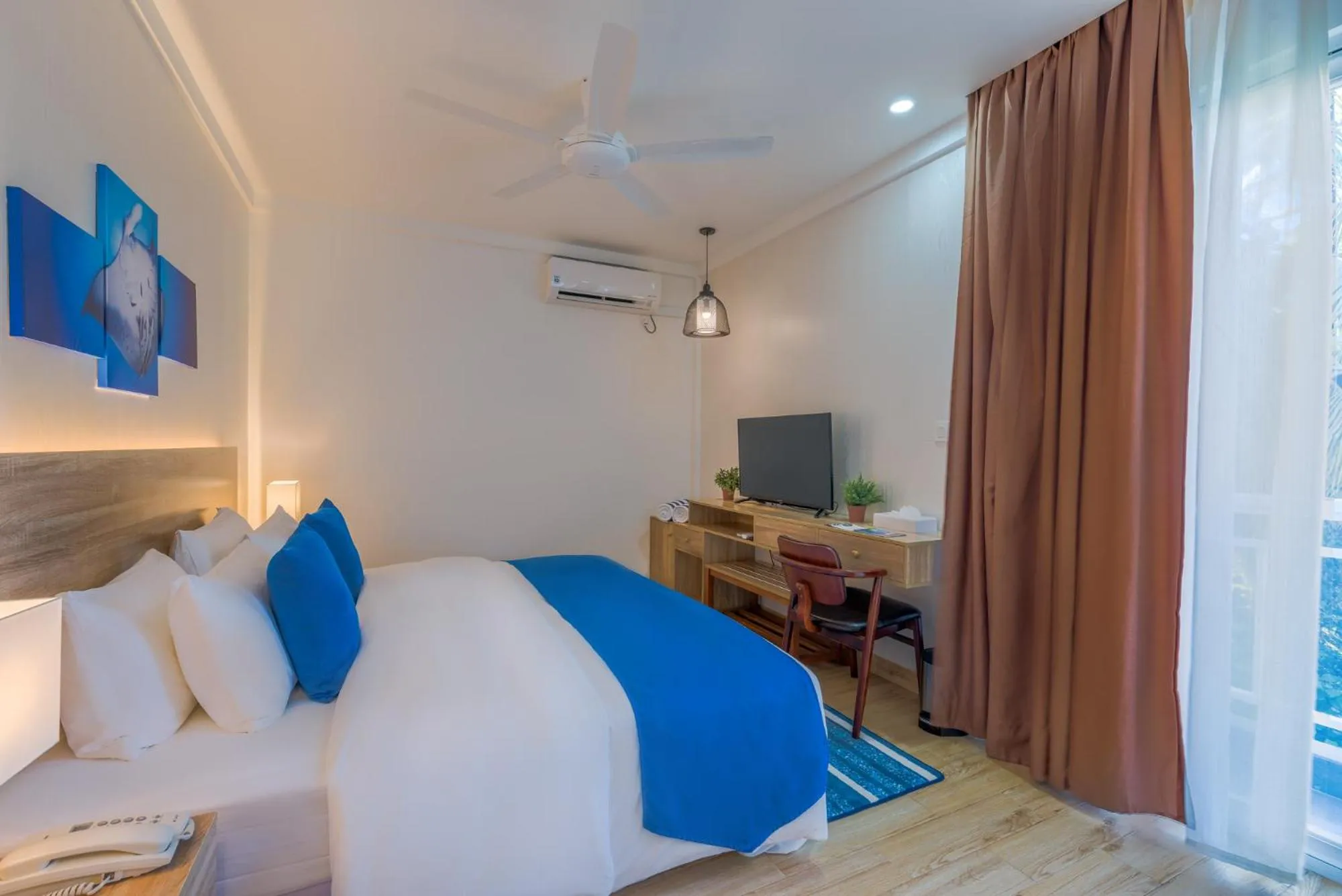 Seating area, Bed in Dhiguveli Maldives