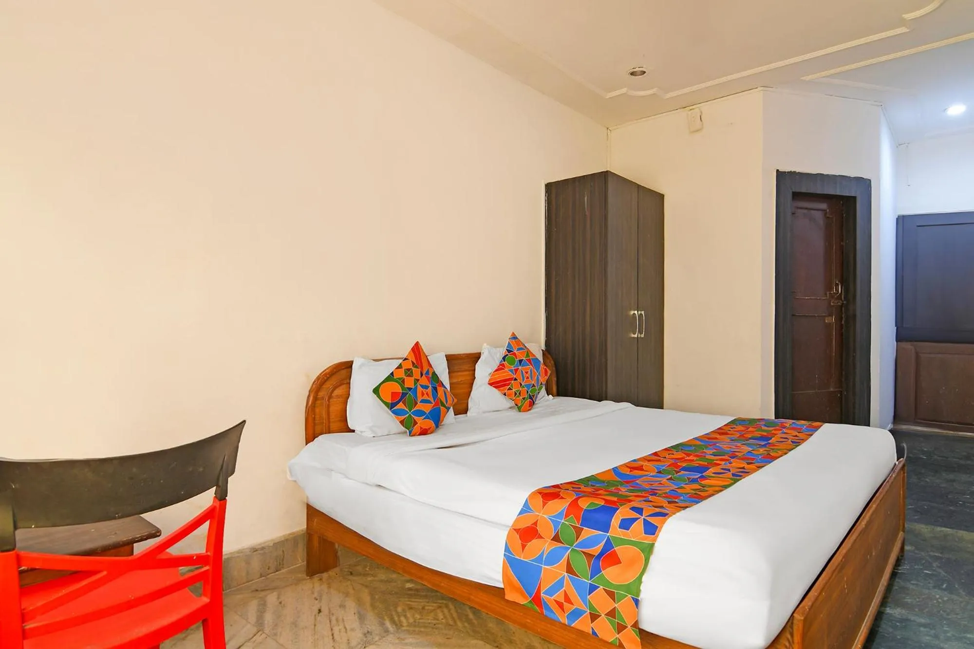 Bed in FabHotel Sai Sagar Residency