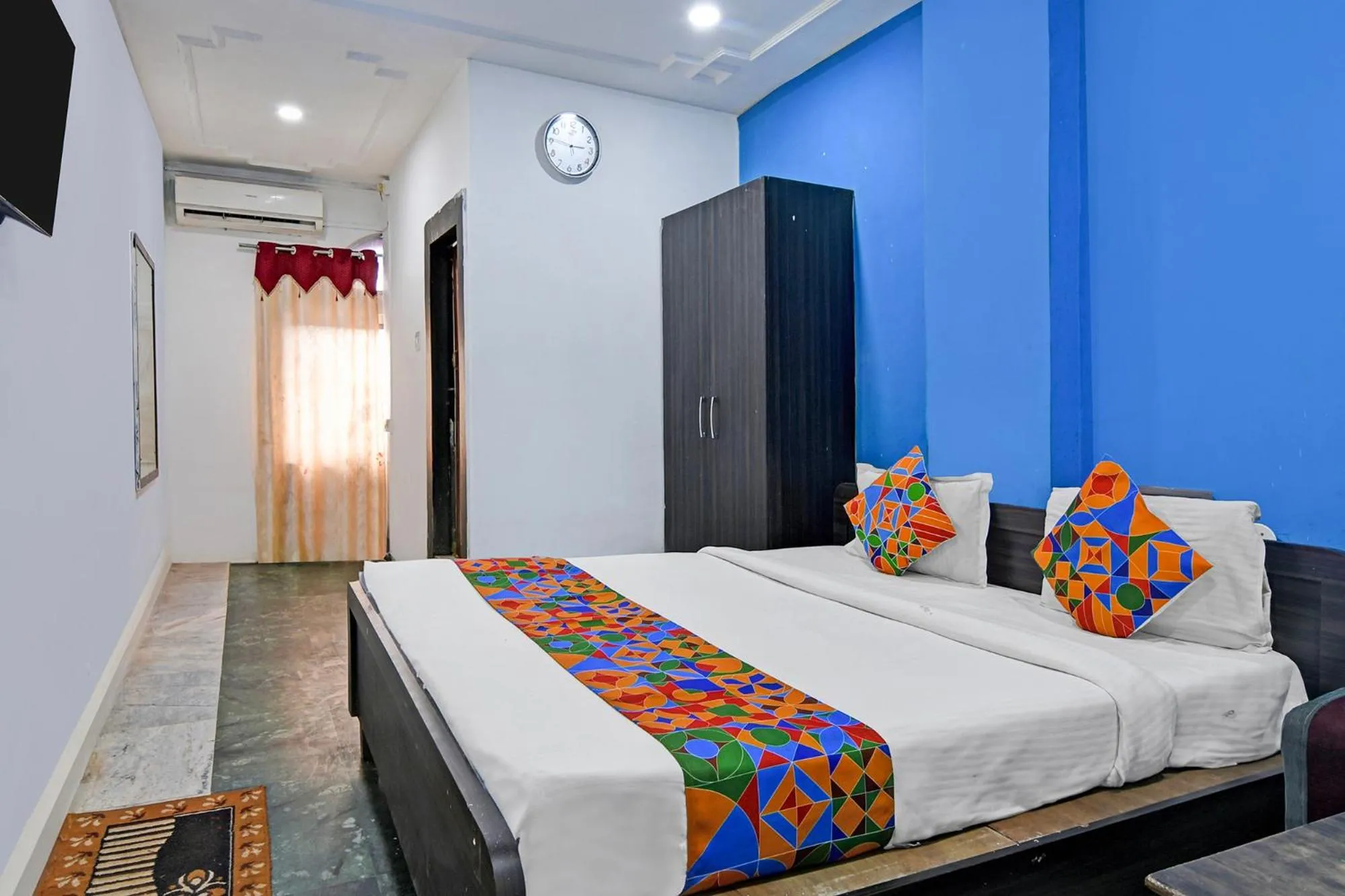 Bed in FabHotel Sai Sagar Residency