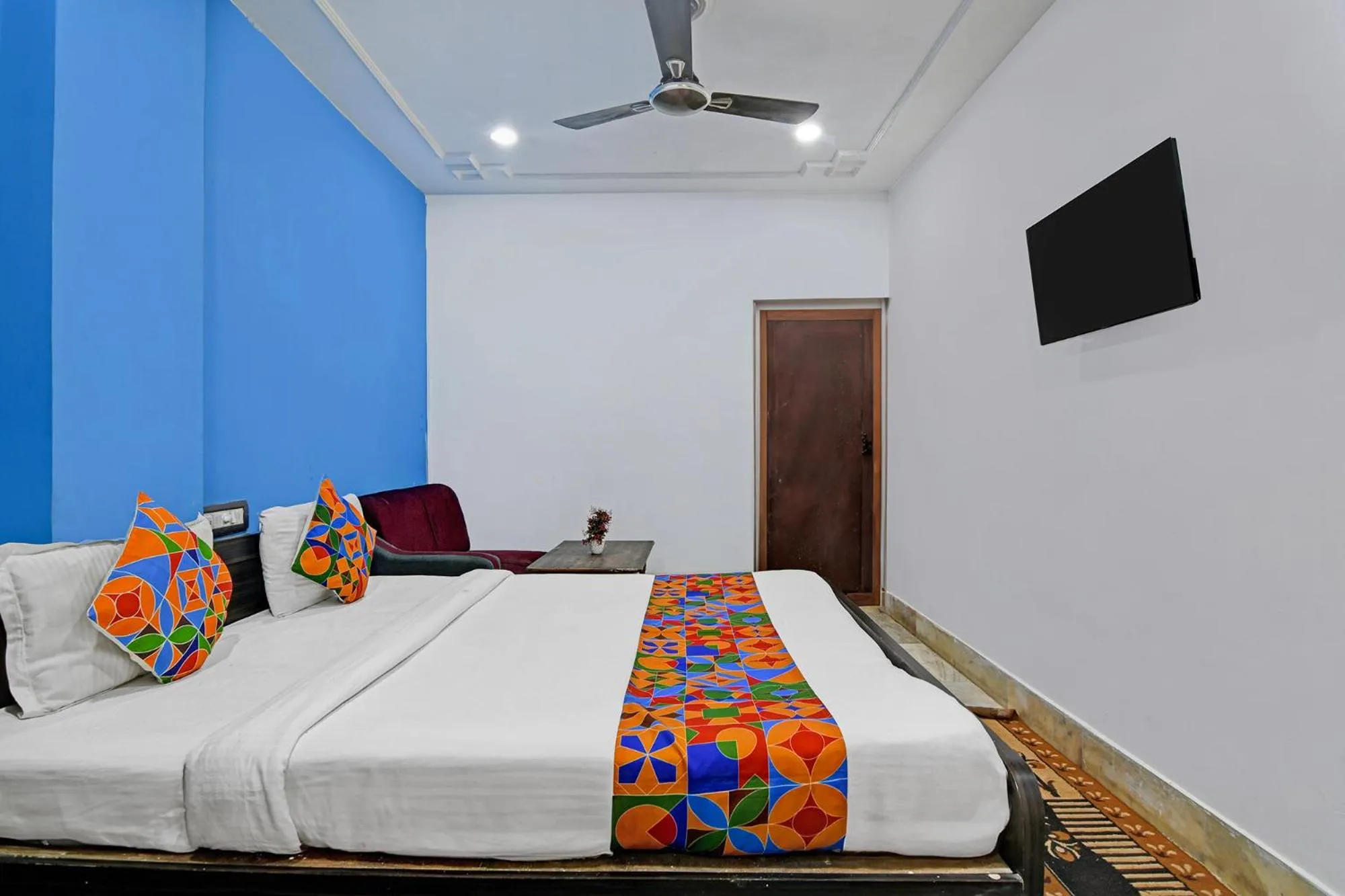 Bed in FabHotel Sai Sagar Residency