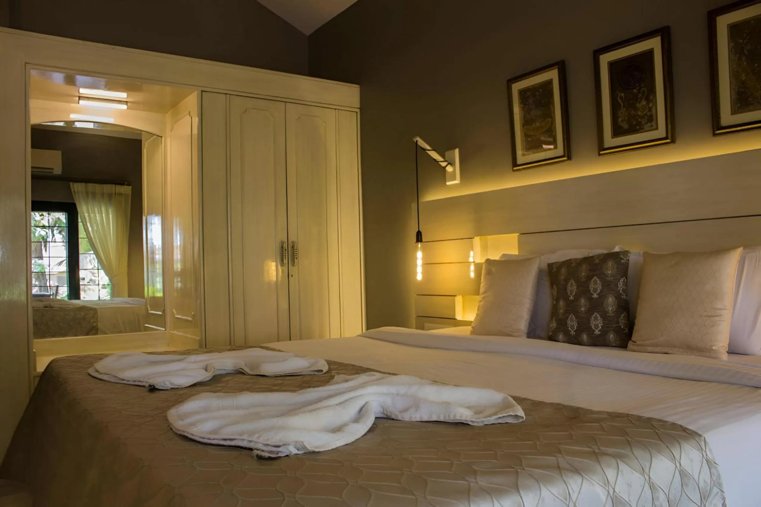 Bed in Shikara Beach Resort