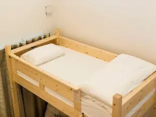 Bed in TRIP POD KOMONDO-MACHI