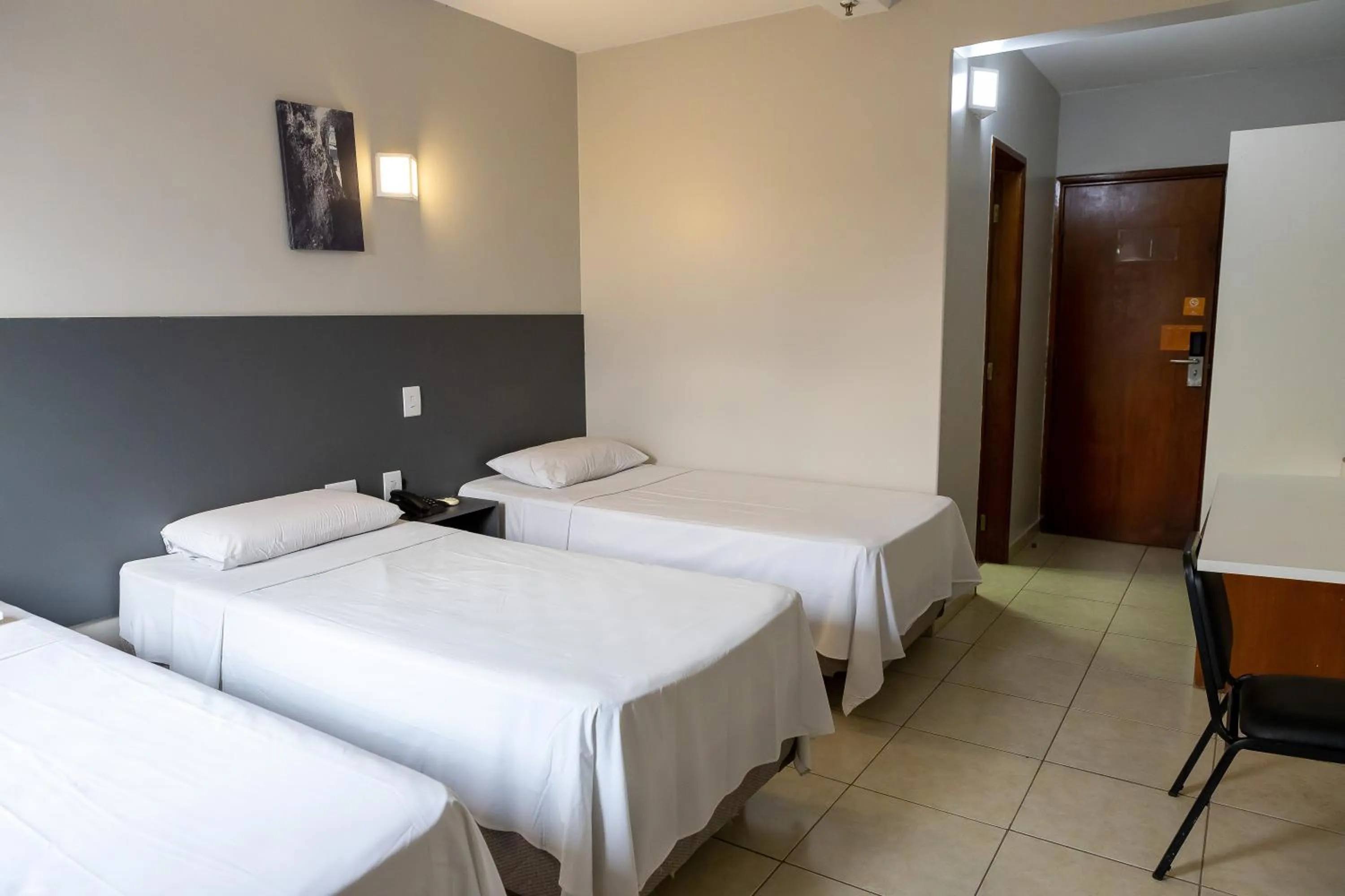 Bed in Allegro Hotel