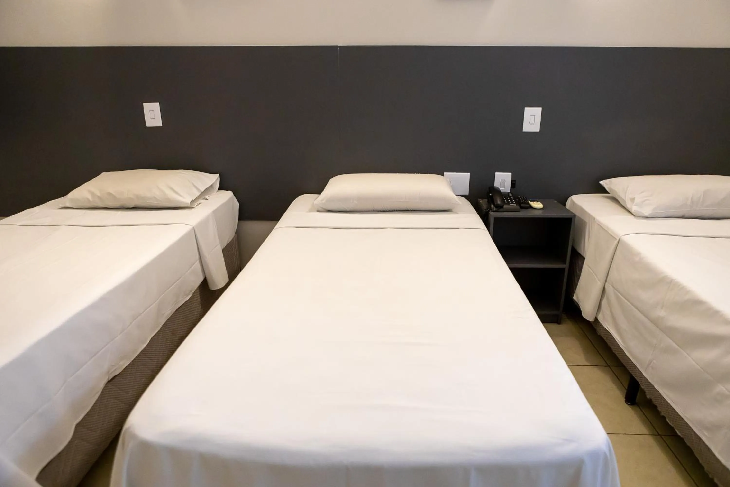 Bed in Allegro Hotel