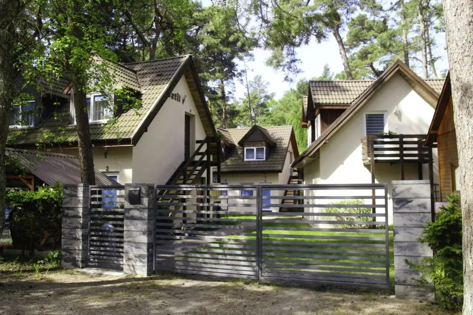 Sztil - Apartamenty i drewniane domki Sztil - Apartamenty i drewniane domki