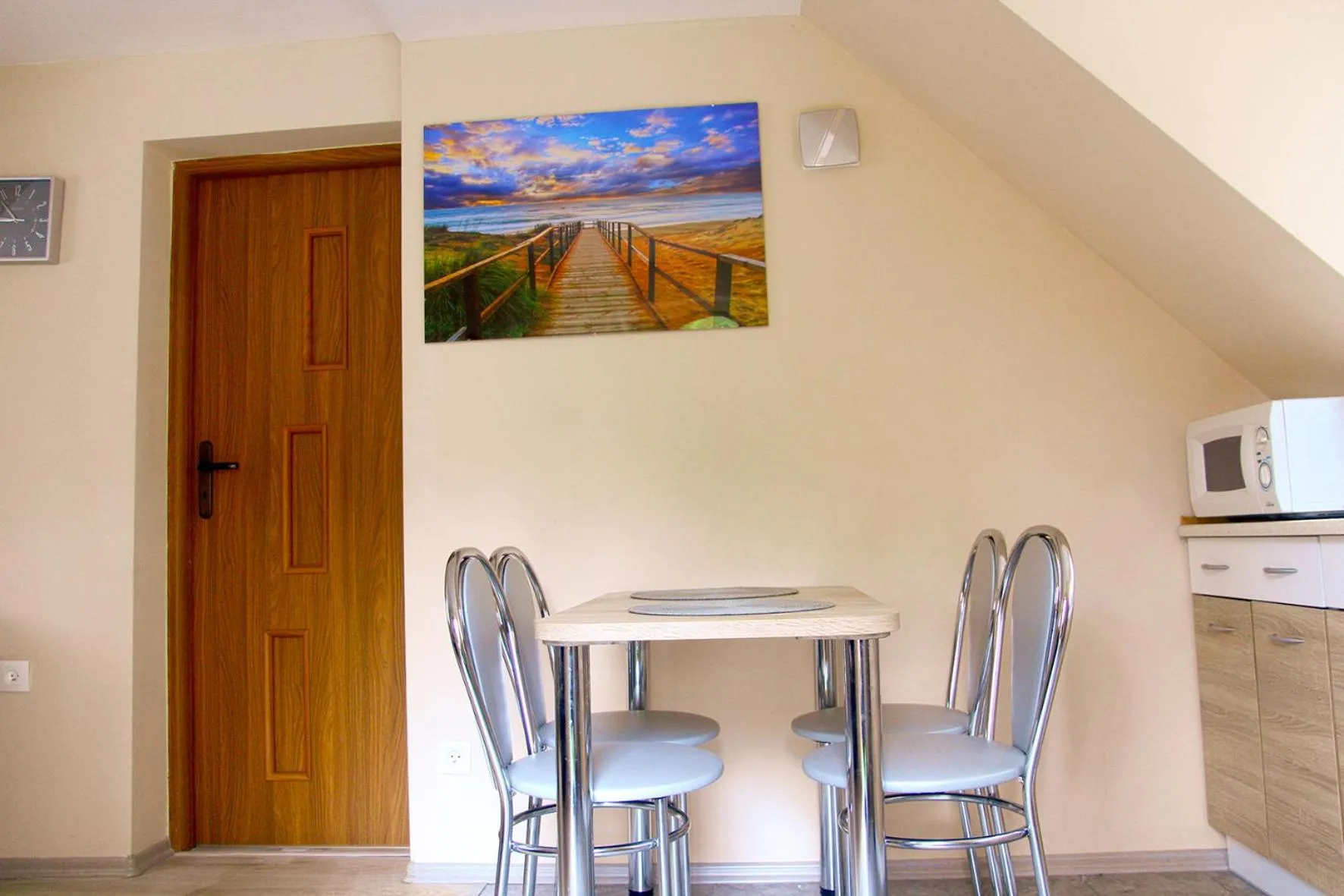 Kitchen or kitchenette in Sztil - Apartamenty i drewniane domki