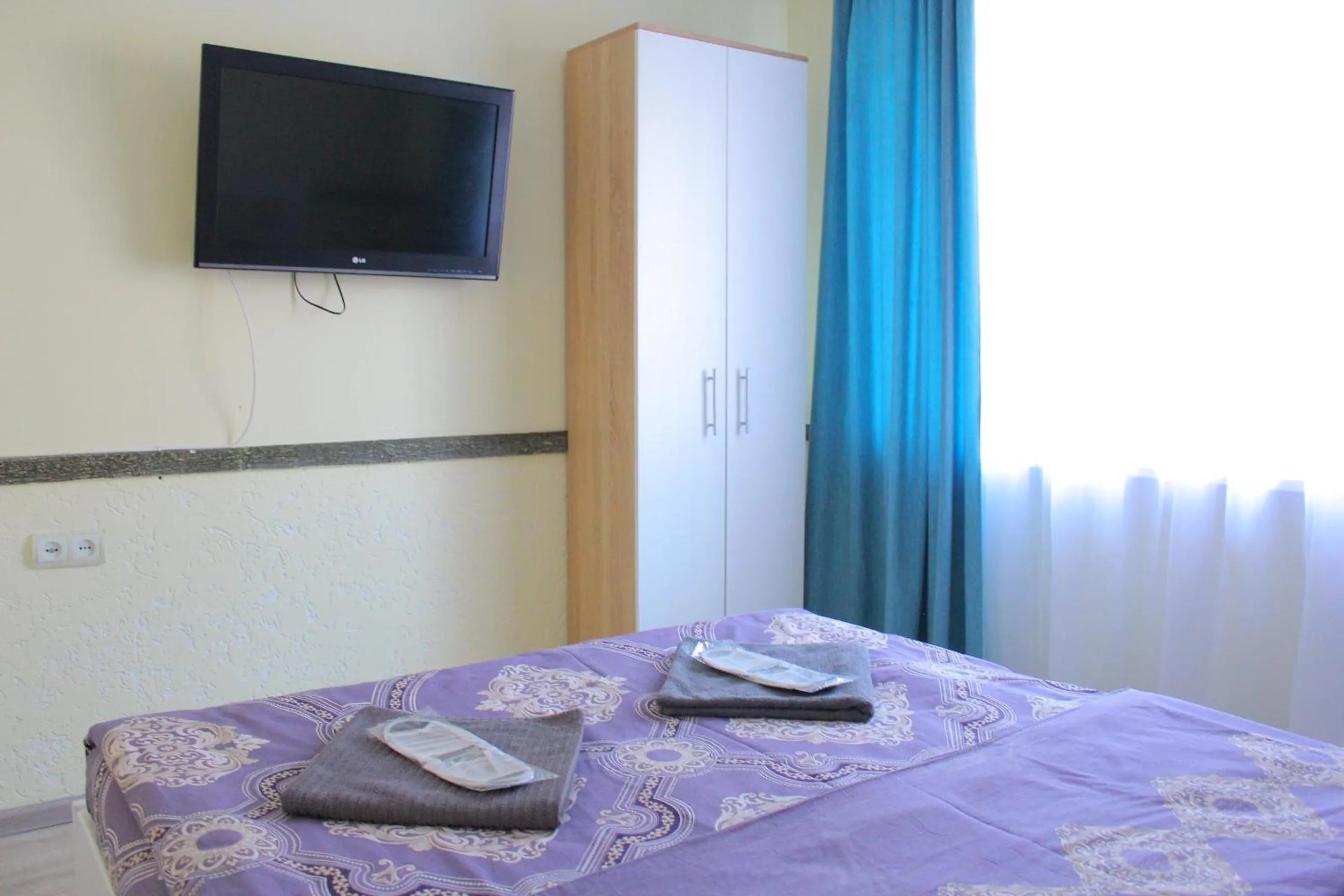 Bed in Uneed Rooms Harbour