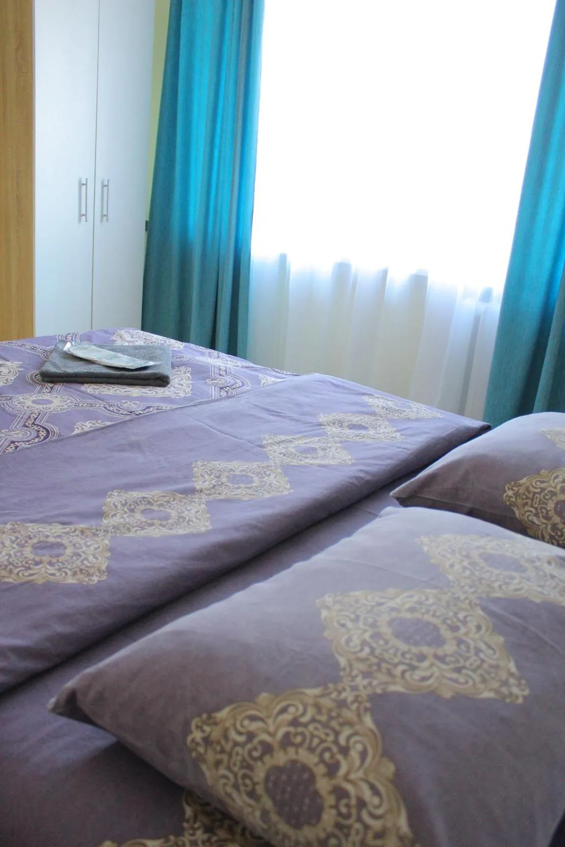 Bed in Uneed Rooms Harbour