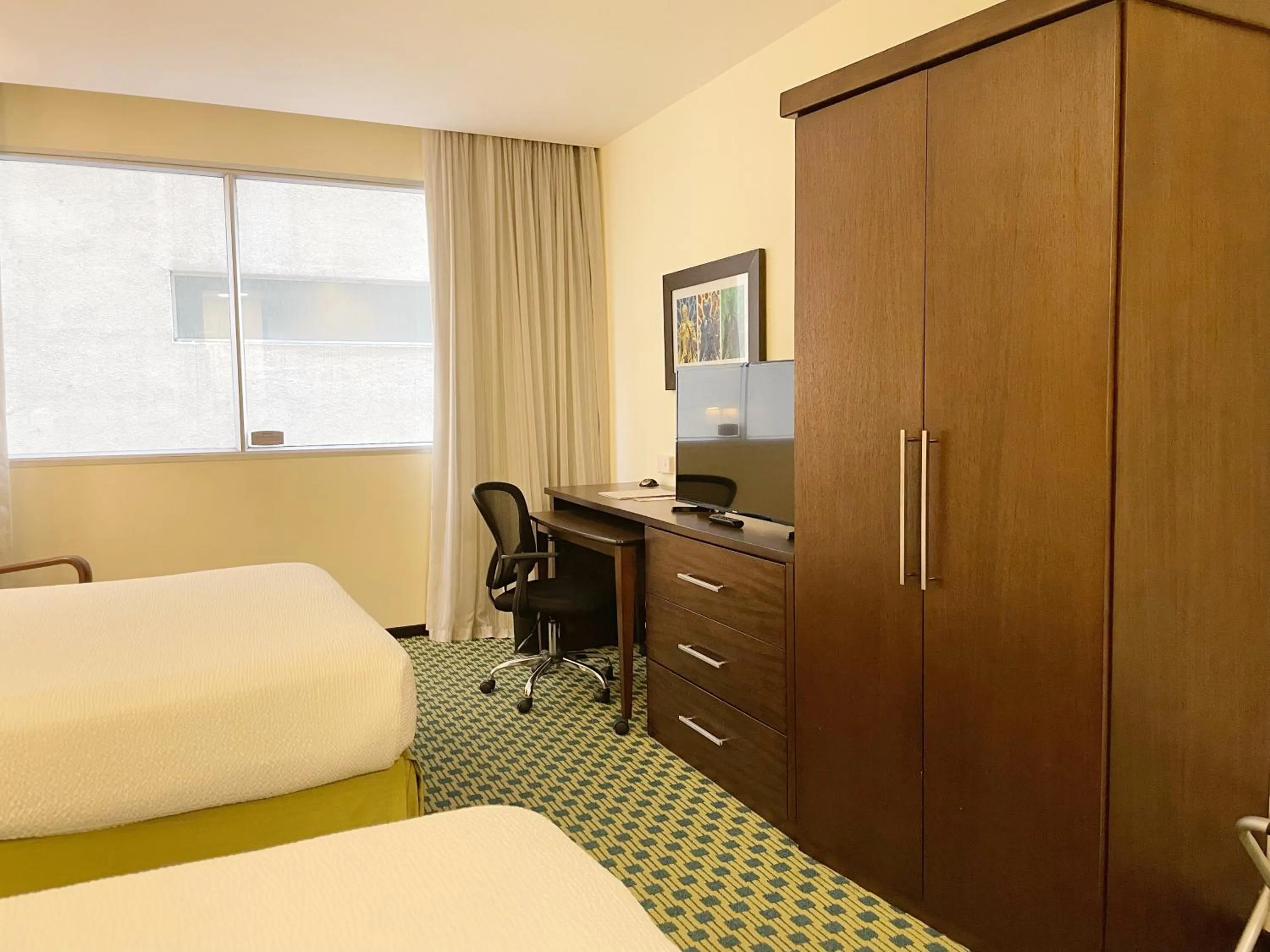 Bed in Courtyard by Marriott Guayaquil